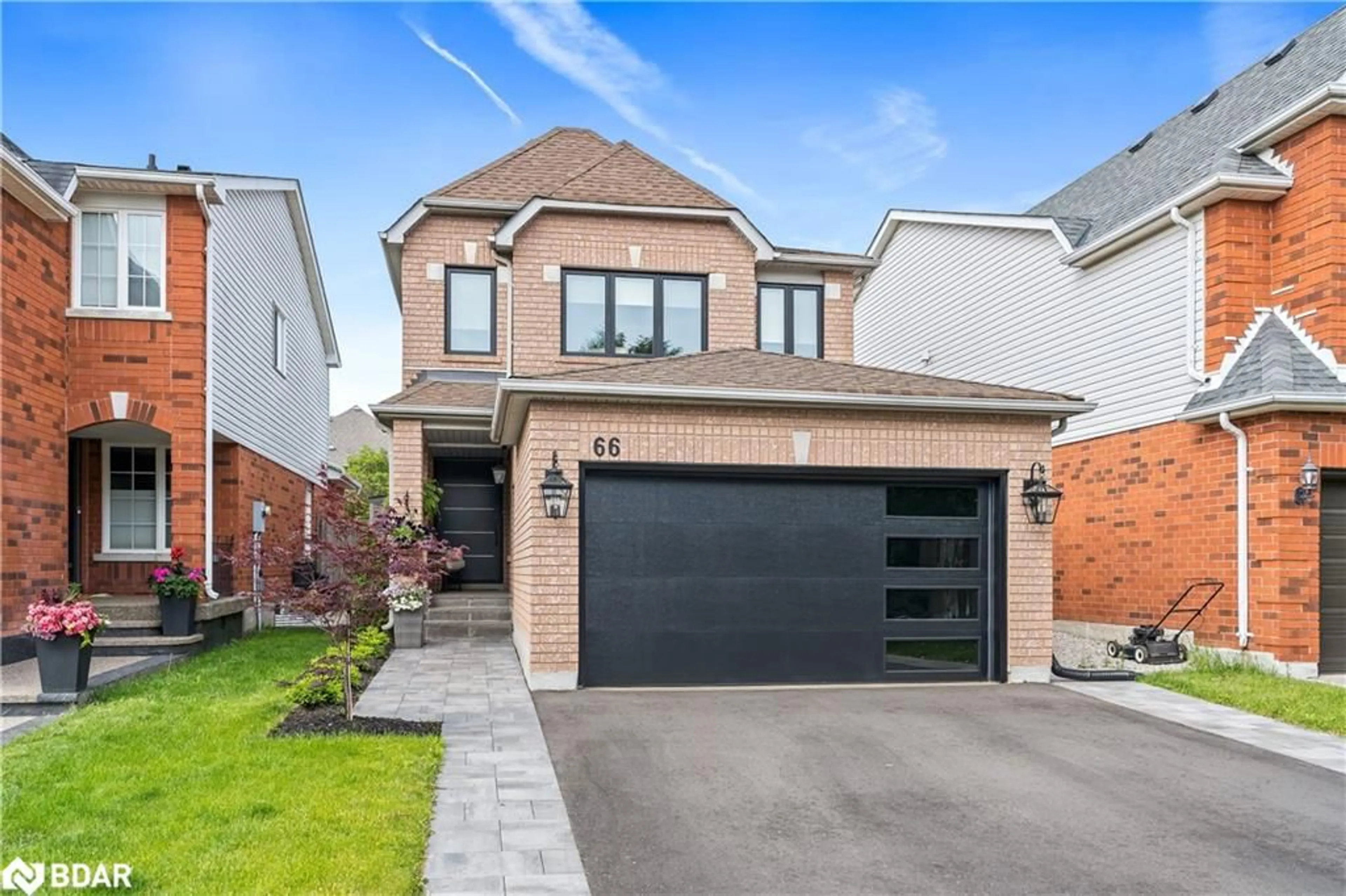 Home with brick exterior material, street for 66 Curry Cres, Georgetown Ontario L7G 5T1