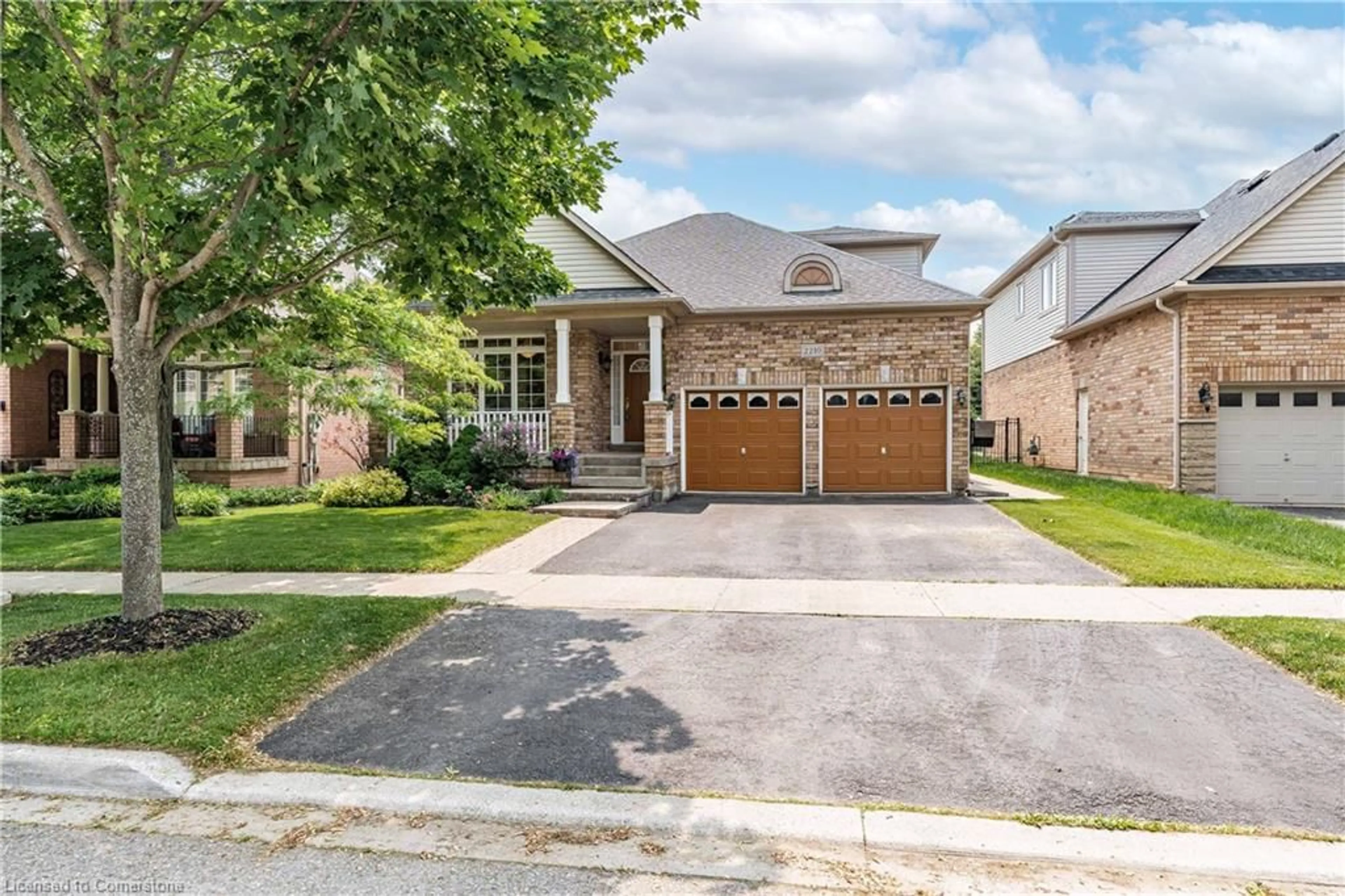 Home with brick exterior material, street for 2210 Tiger Rd, Burlington Ontario L7M 4W9