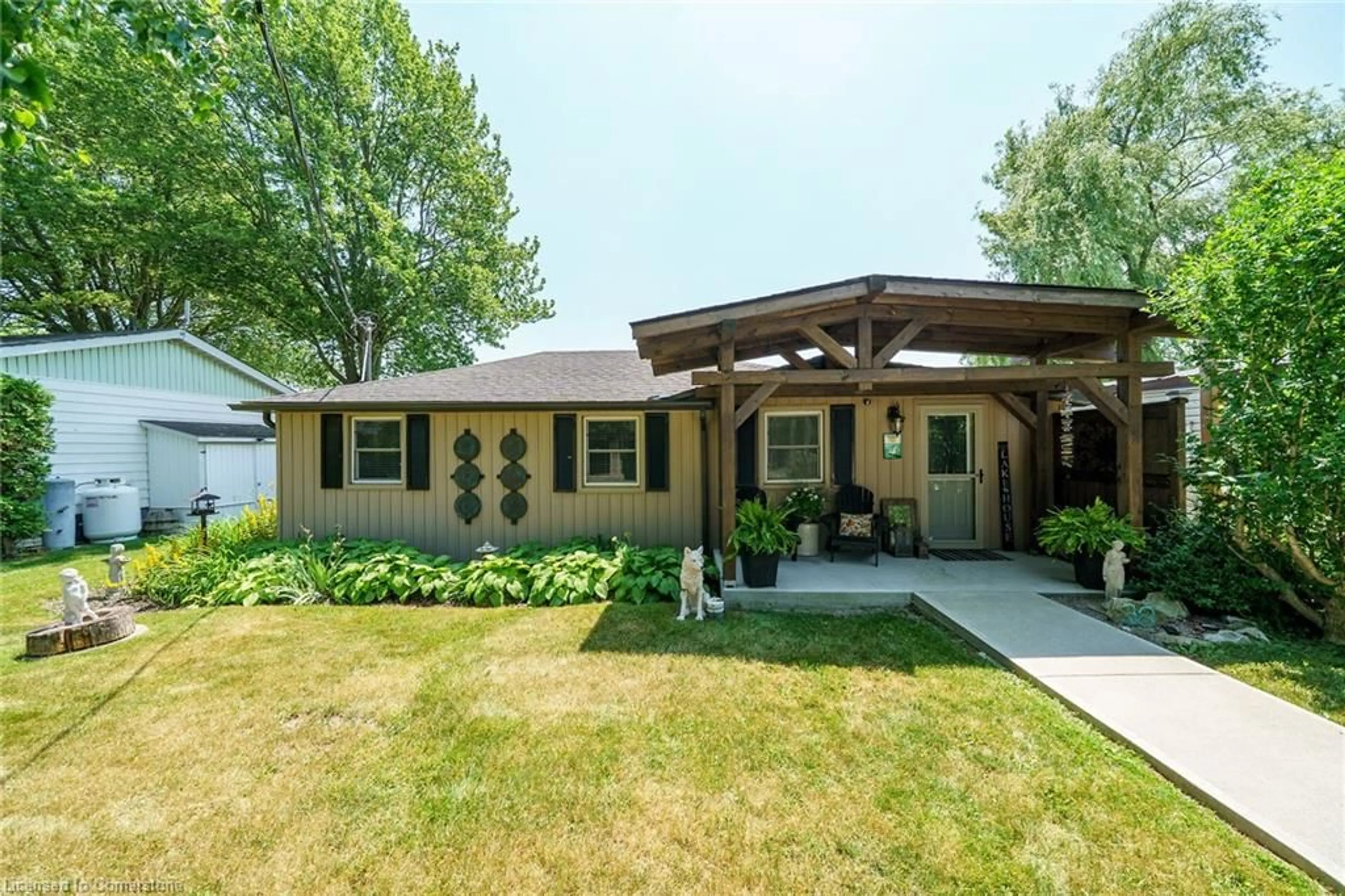 Home with vinyl exterior material, street for 570 South Coast Dr, Nanticoke Ontario N0A 1L0