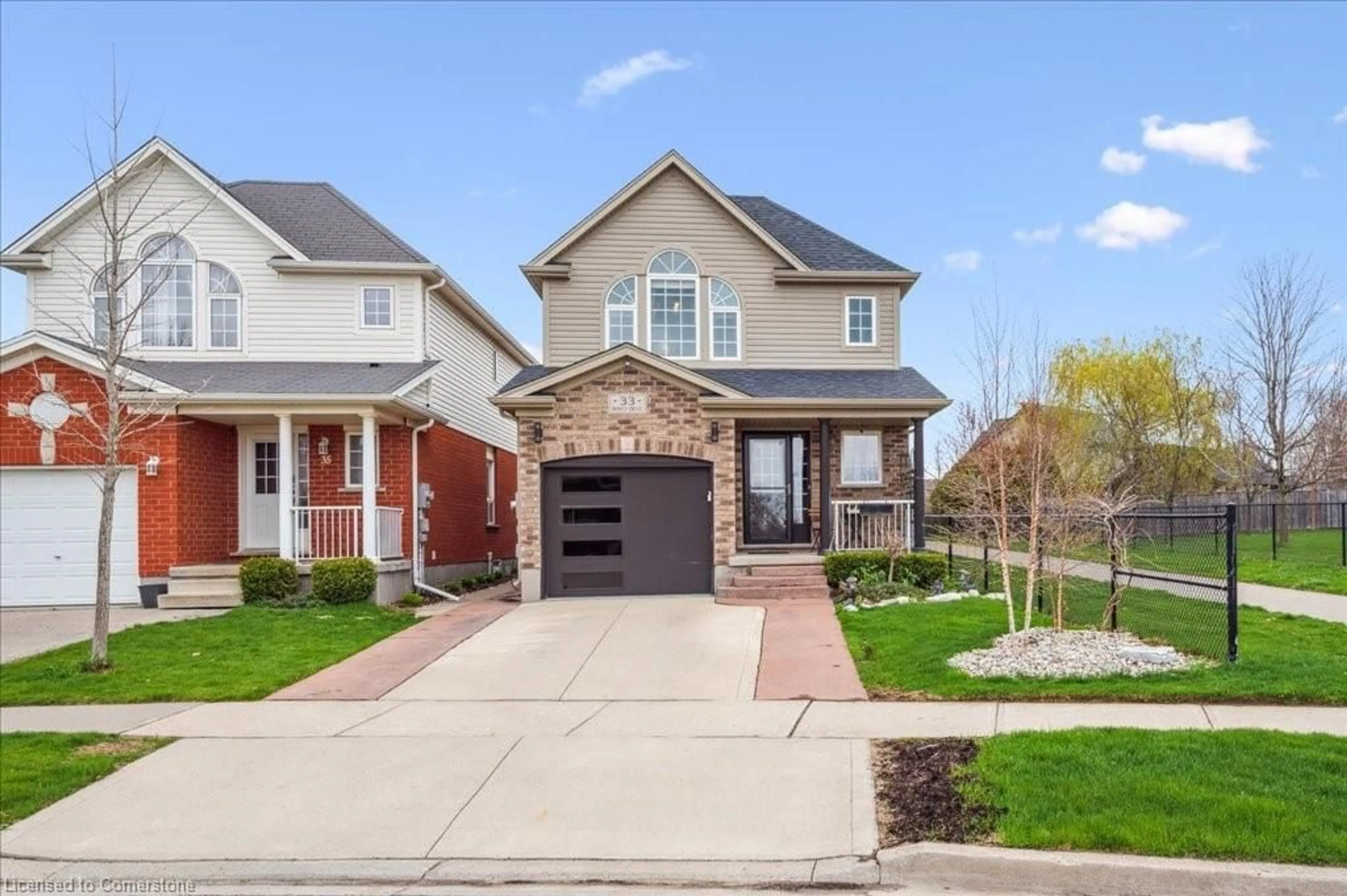 Home with brick exterior material, street for 33 Bowen Dr, Guelph Ontario N1E 0C9