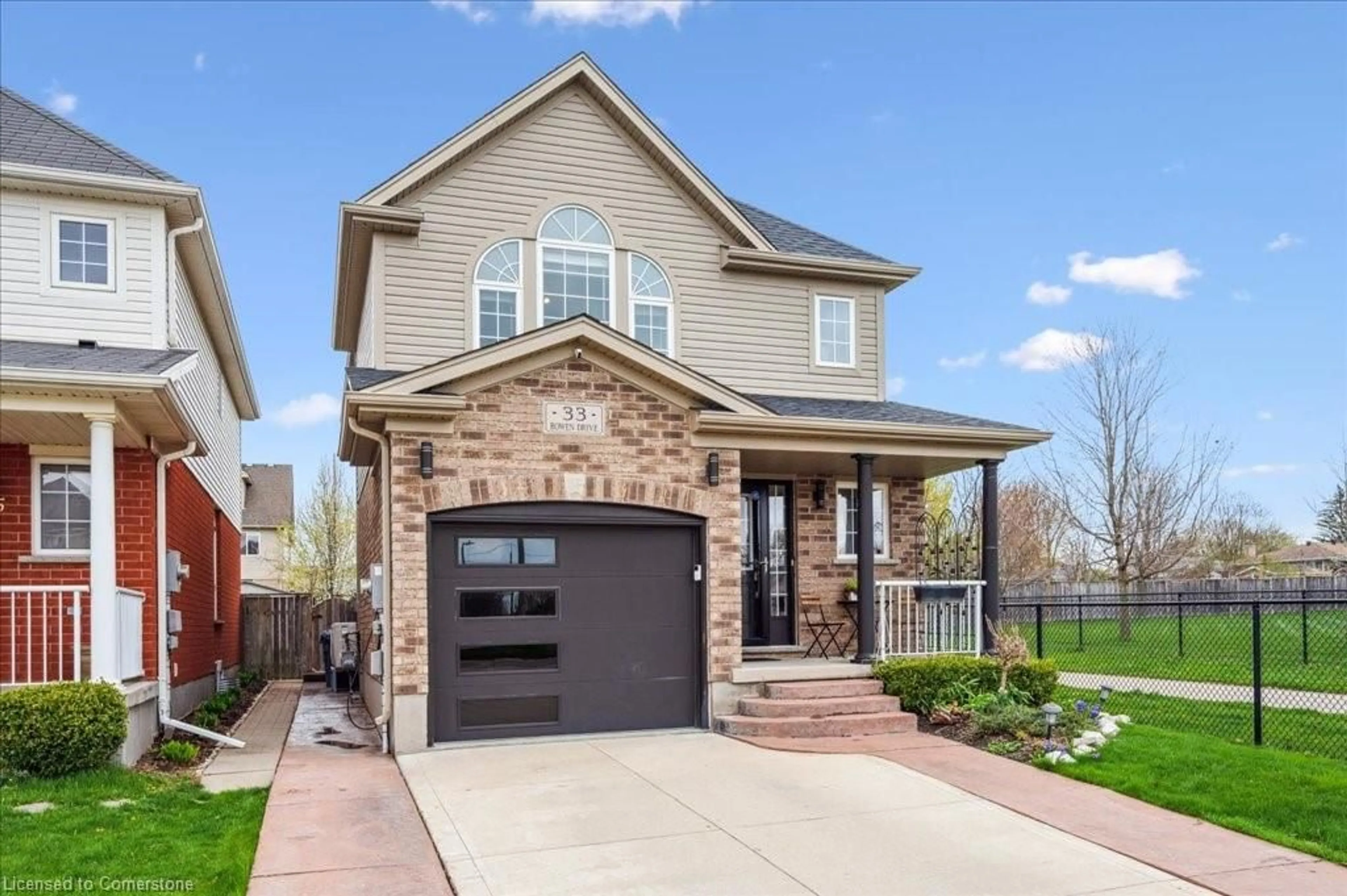 Home with brick exterior material, street for 33 Bowen Dr, Guelph Ontario N1E 0C9