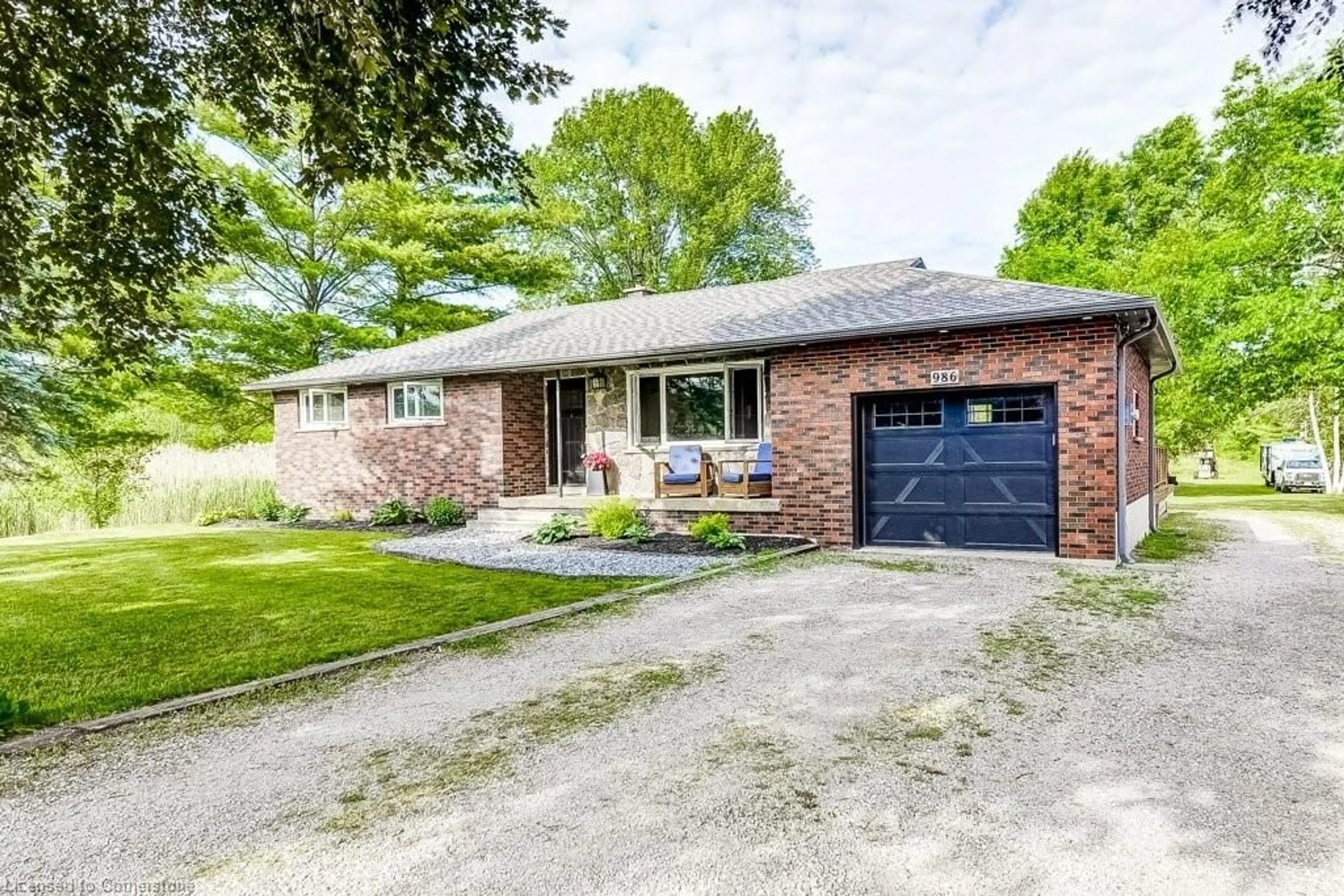 Home with brick exterior material, street for 986 Westover Rd, Hamilton Ontario N0B 1L0