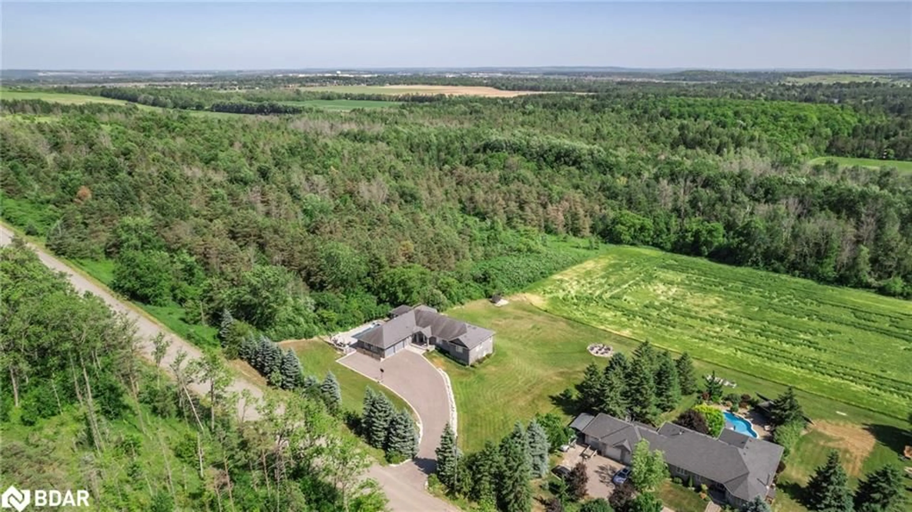 A pic from outside/outdoor area/front of a property/back of a property/a pic from drone, forest/trees view for 7765 5th Sideroad Tos, Adjala-Tosorontio Ontario L9R 1V3