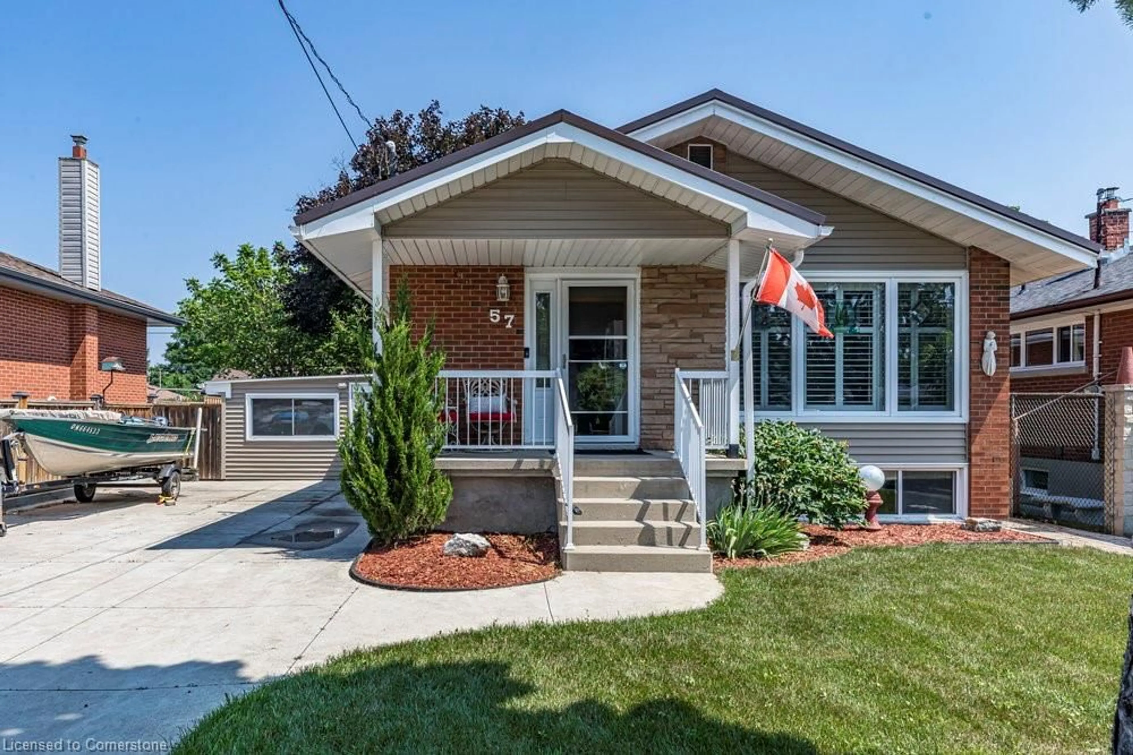 Home with brick exterior material, street for 57 Burfield Ave, Hamilton Ontario L8T 2J8