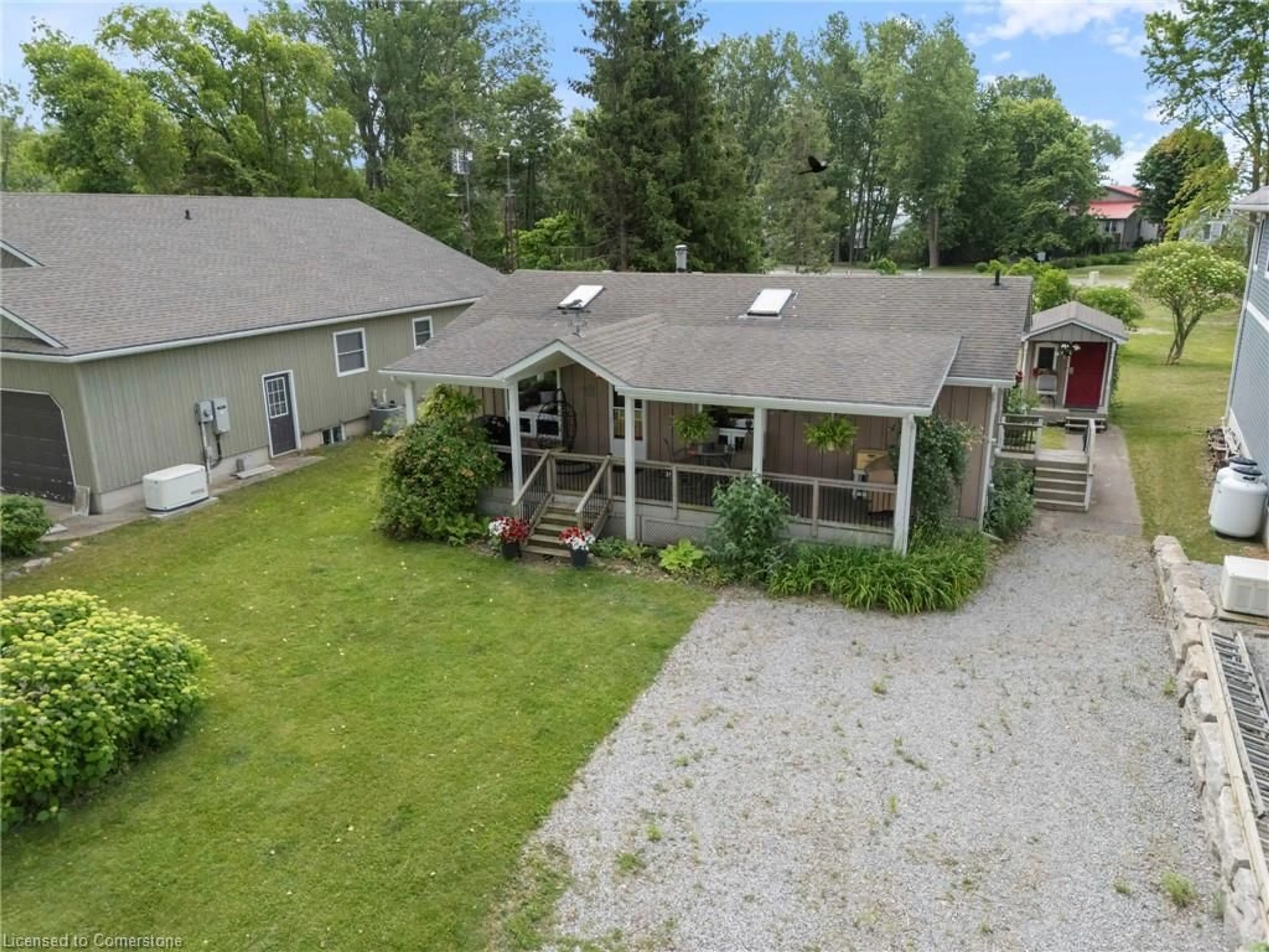 A pic from outside/outdoor area/front of a property/back of a property/a pic from drone, unknown for 5 Warbler Lane, Long Point Ontario N0E 1M0