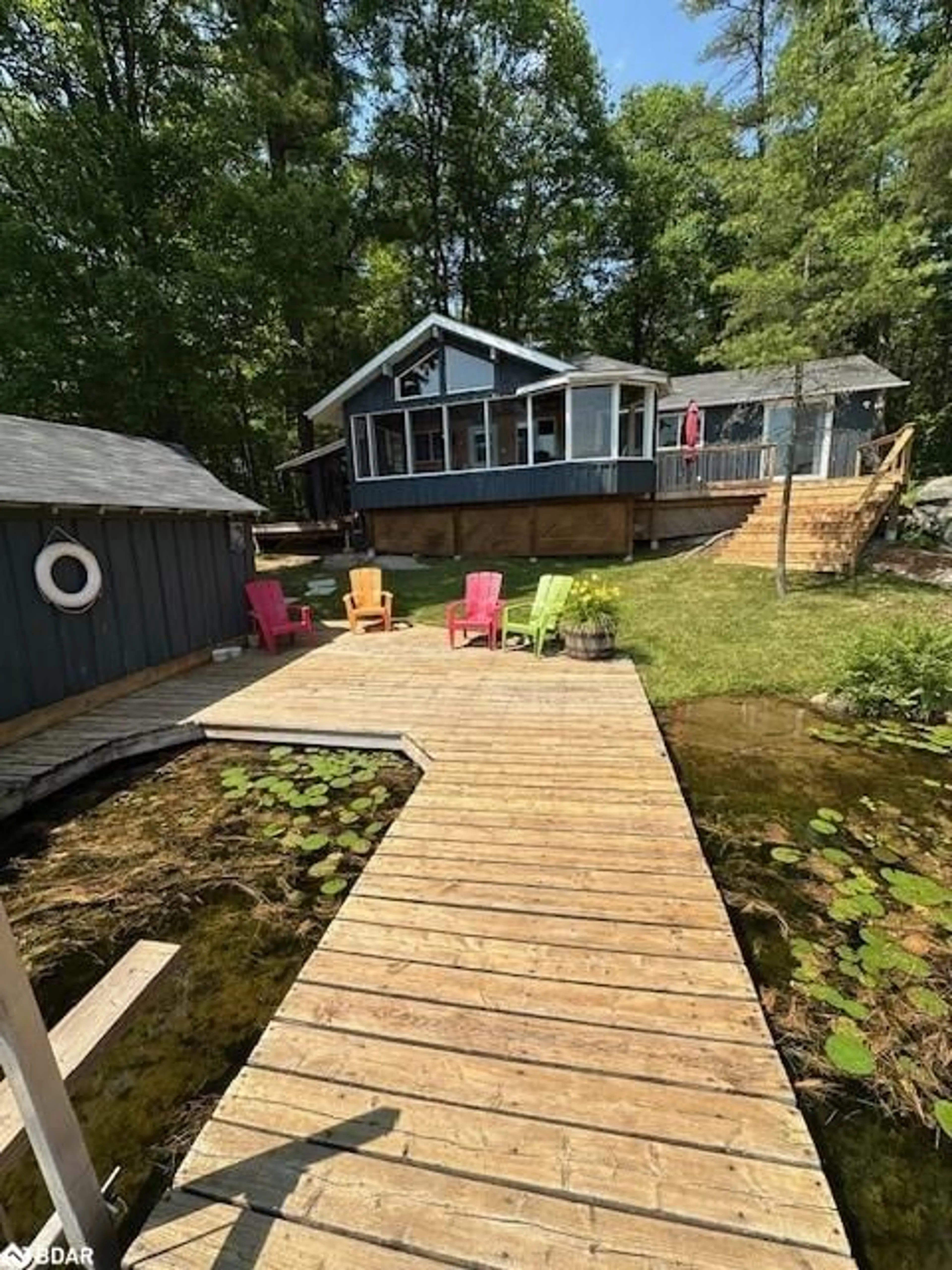 A pic from outside/outdoor area/front of a property/back of a property/a pic from drone, water/lake/river/ocean view for 7206 Severn River Shr Shore, Port Severn Ontario P0C 1M0