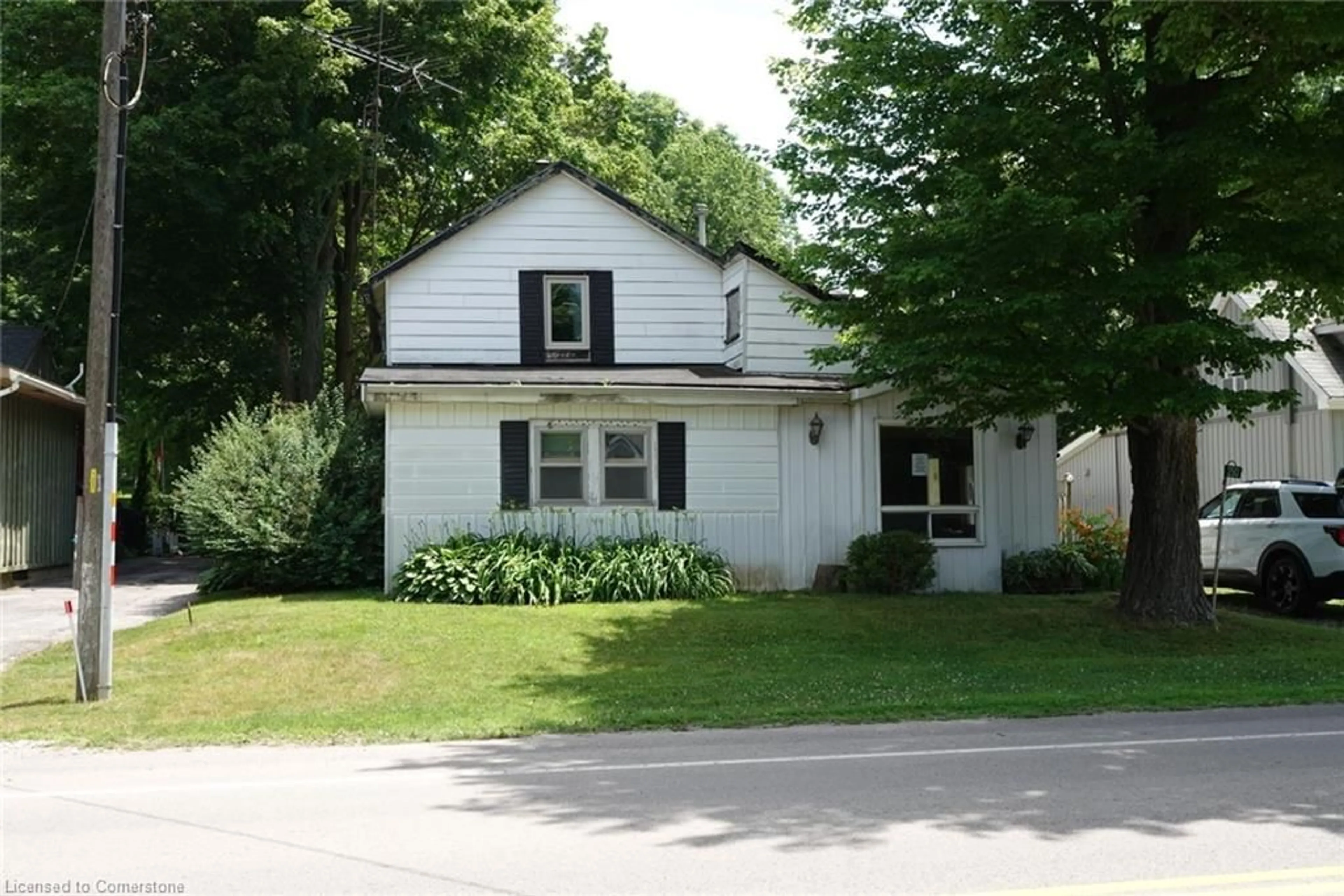 Home with vinyl exterior material, street for 250 Old Highway 24, Bloomsburg Ontario N0E 1Y0