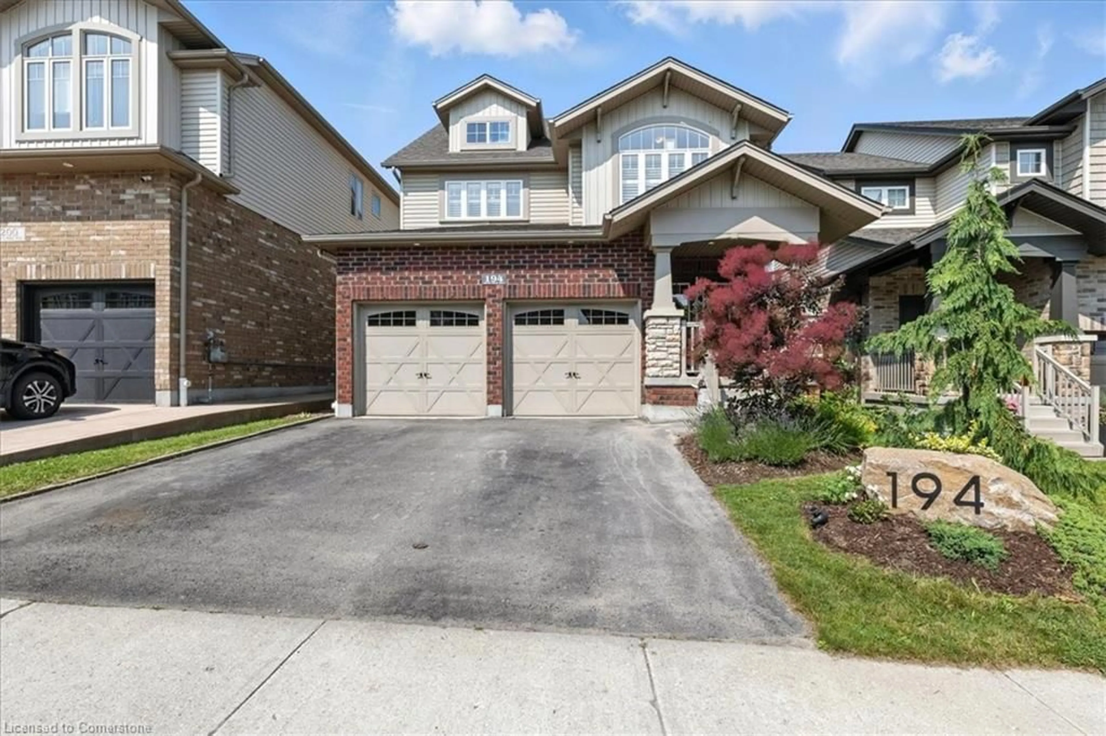 Home with brick exterior material, street for 194 Gravel Ridge Trail, Kitchener Ontario N2E 0E5
