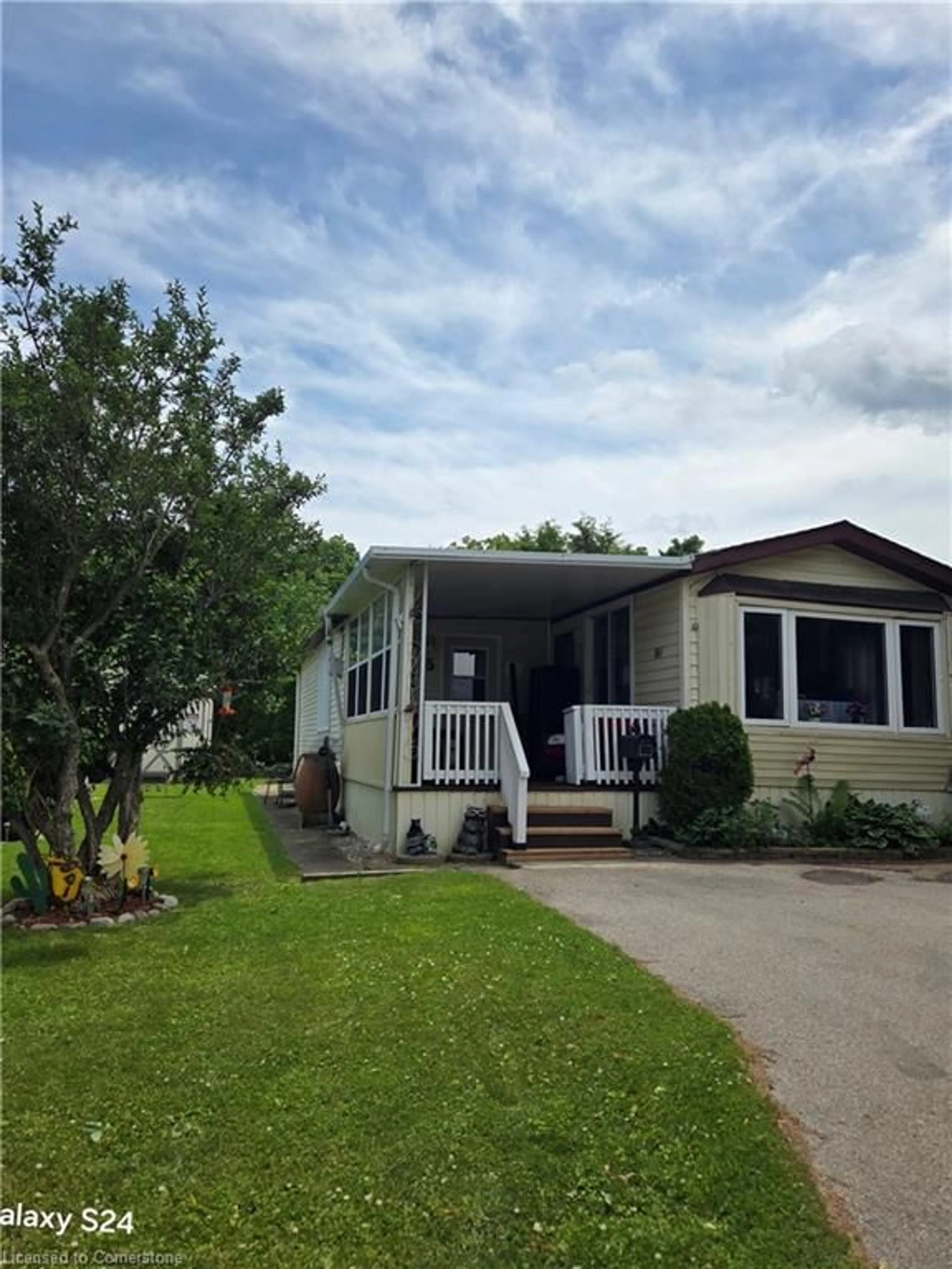 Home with vinyl exterior material, street for 2490 Governors Rd #5 Pondview, Ancaster Ontario N0E 1A0