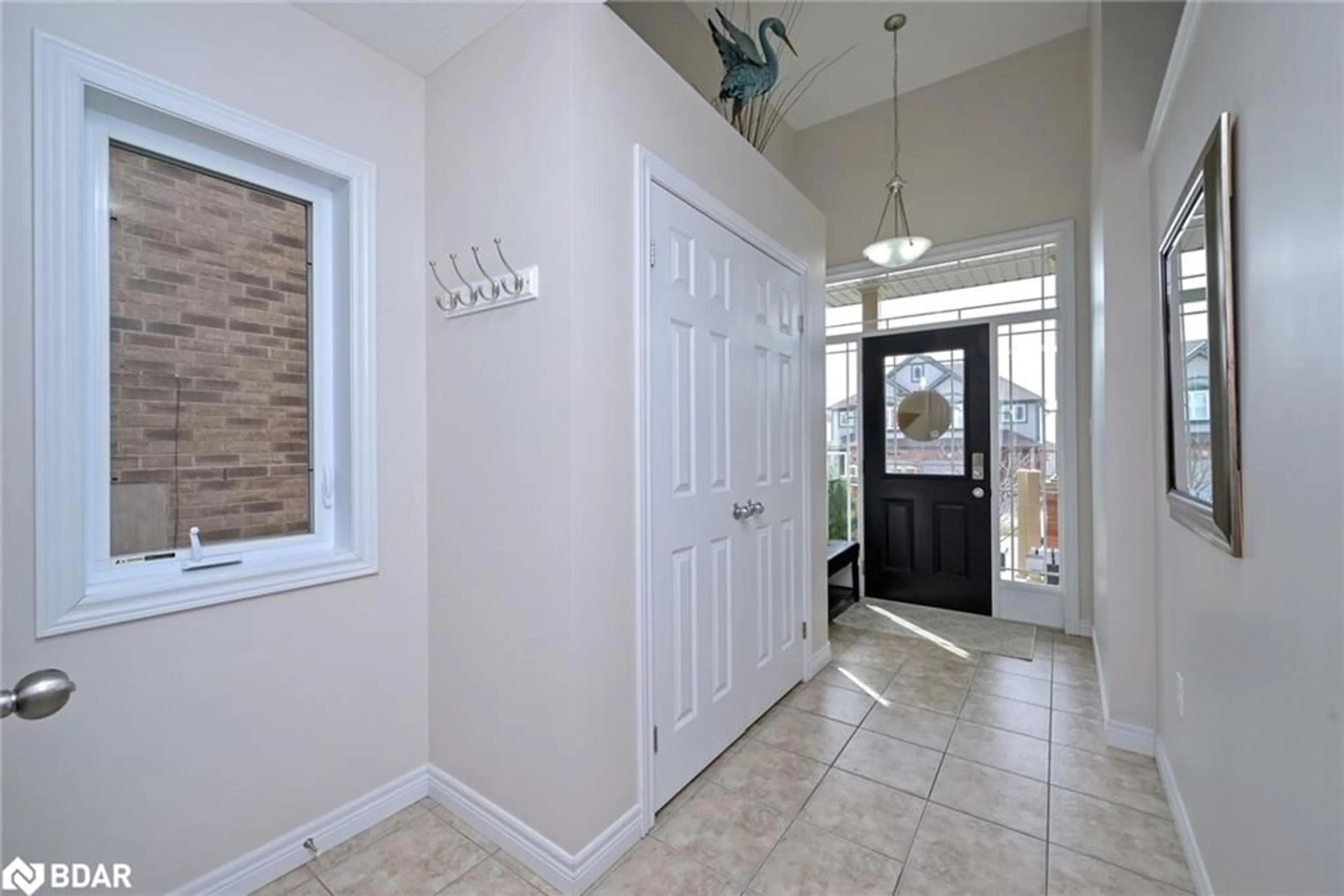Indoor entryway for 102 Oakes Crescent Cres, Guelph Ontario N1E 0J5