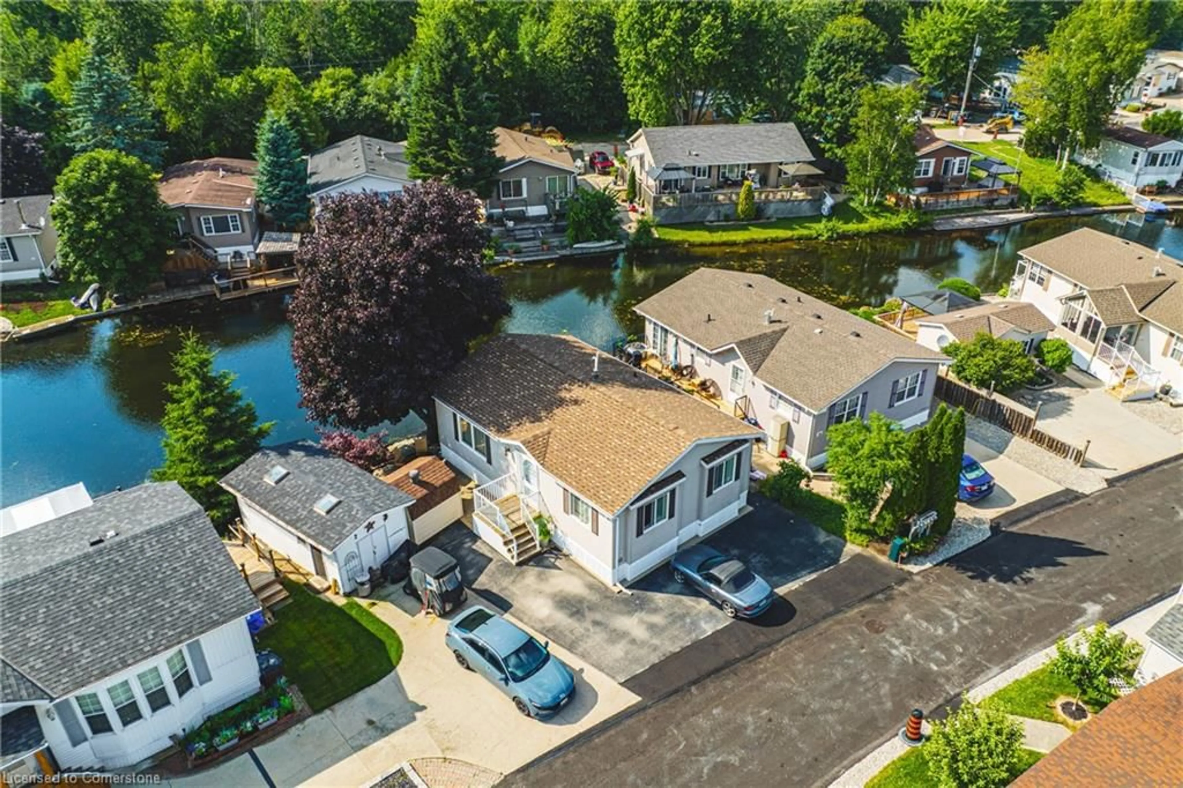 A pic from outside/outdoor area/front of a property/back of a property/a pic from drone, water/lake/river/ocean view for 52 Hemlock Crs Pvt, Puslinch Ontario N0B 2J0
