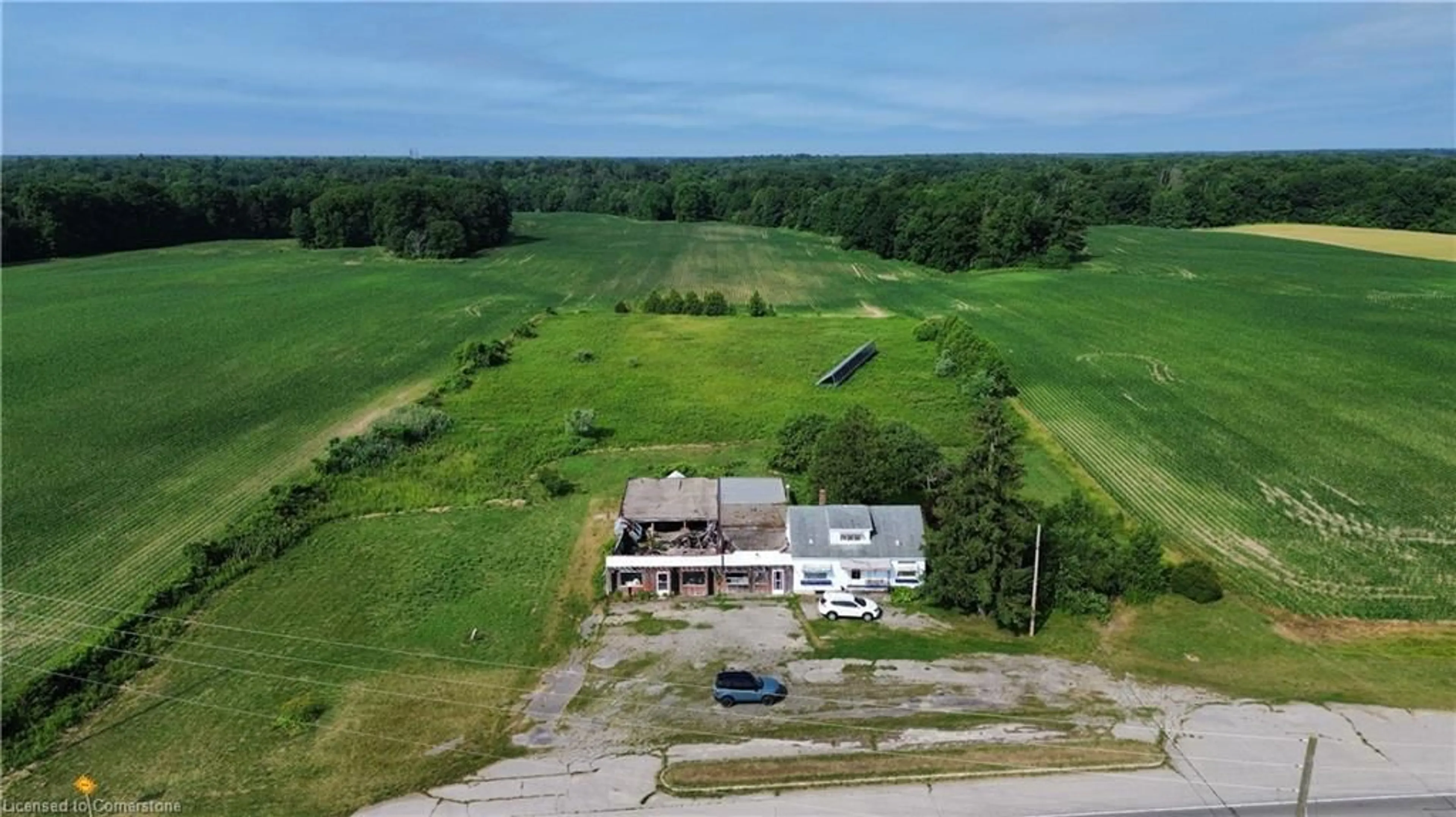 A pic from outside/outdoor area/front of a property/back of a property/a pic from drone, building for 2995 Highway 59, Walsingham Ontario N0E 1G0