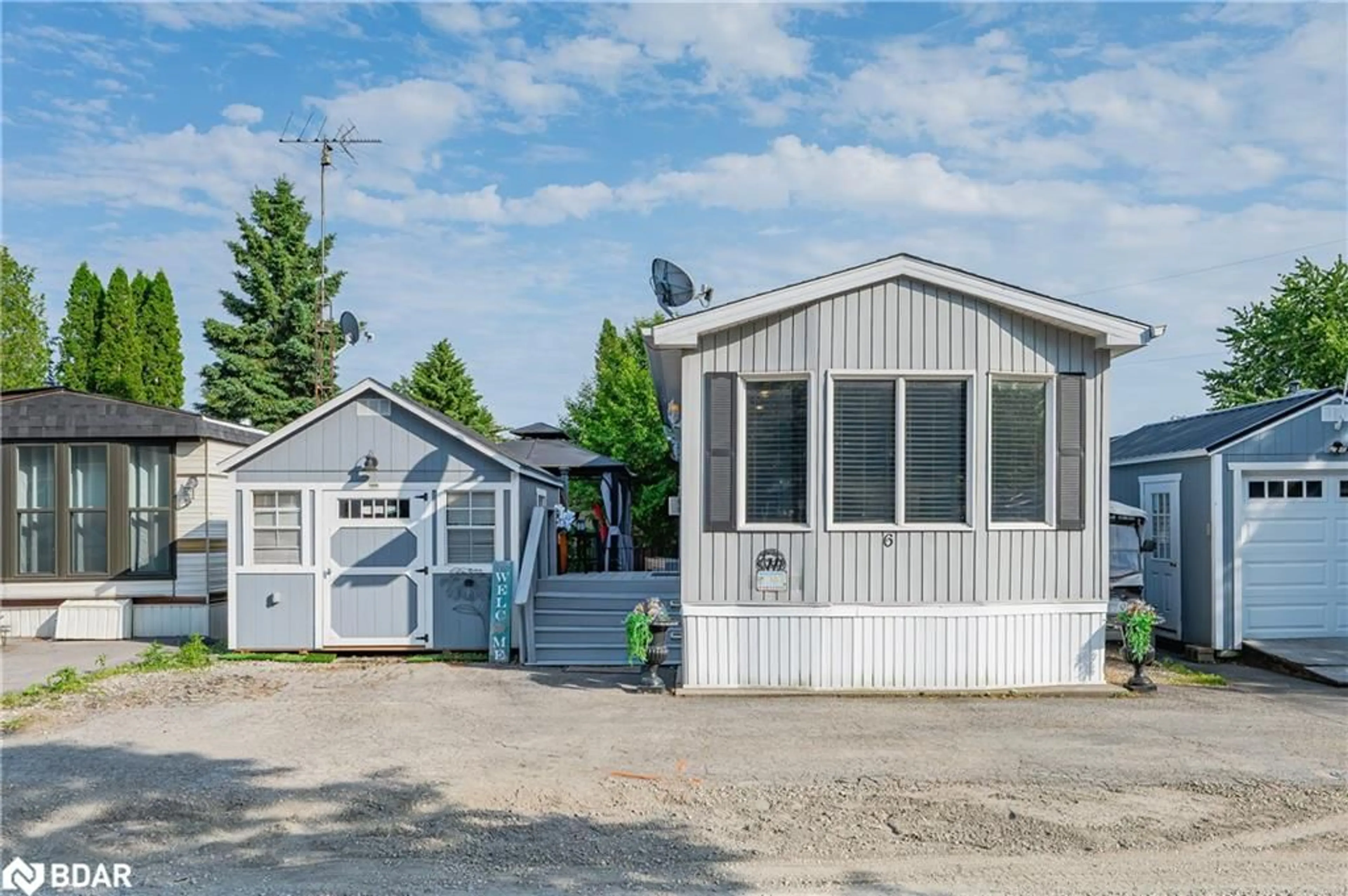 Home with vinyl exterior material, street for 6 Water Street Pvt, Puslinch Ontario N1H 6H9
