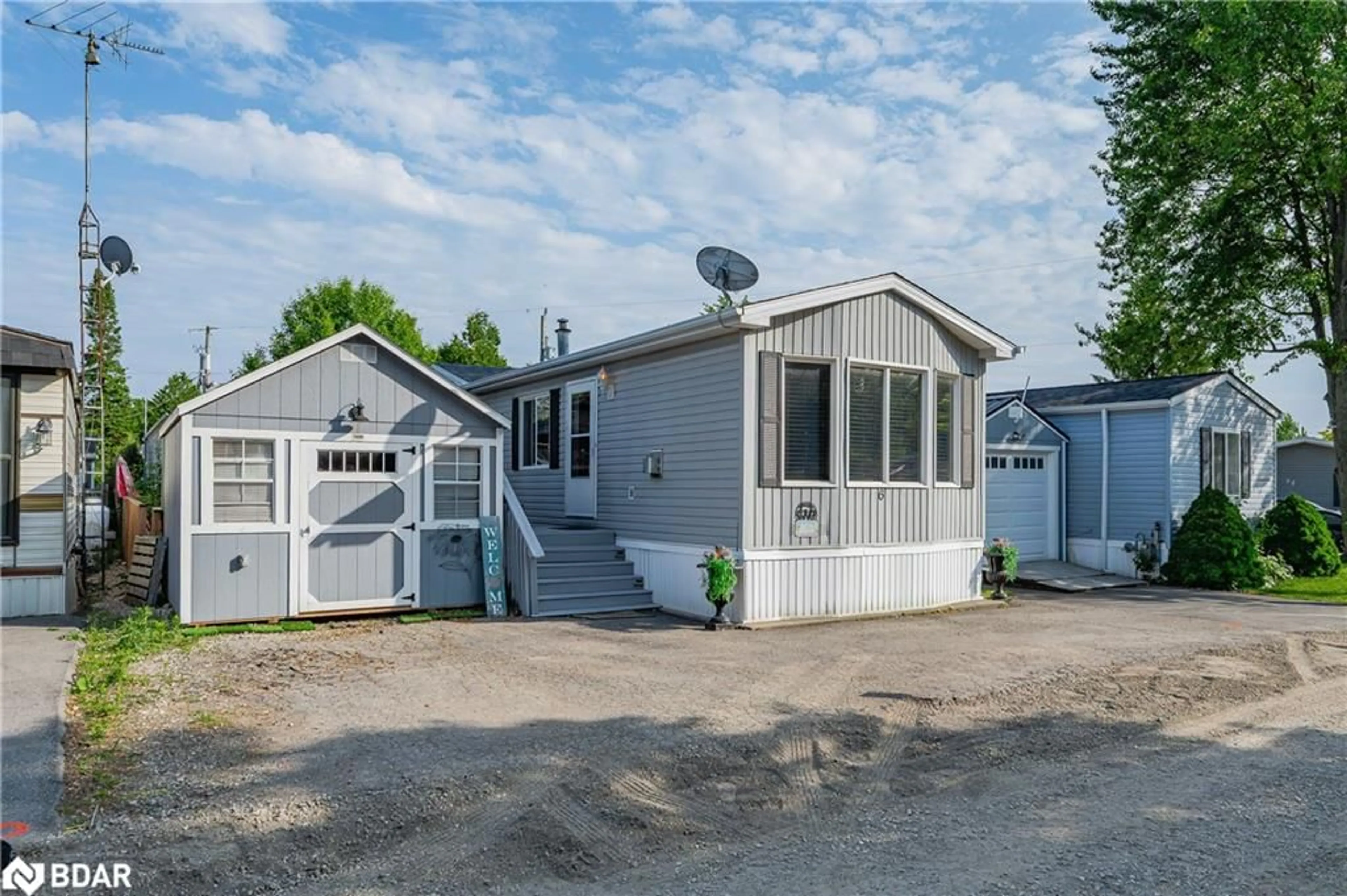 Home with vinyl exterior material, street for 6 Water Street Pvt, Puslinch Ontario N1H 6H9