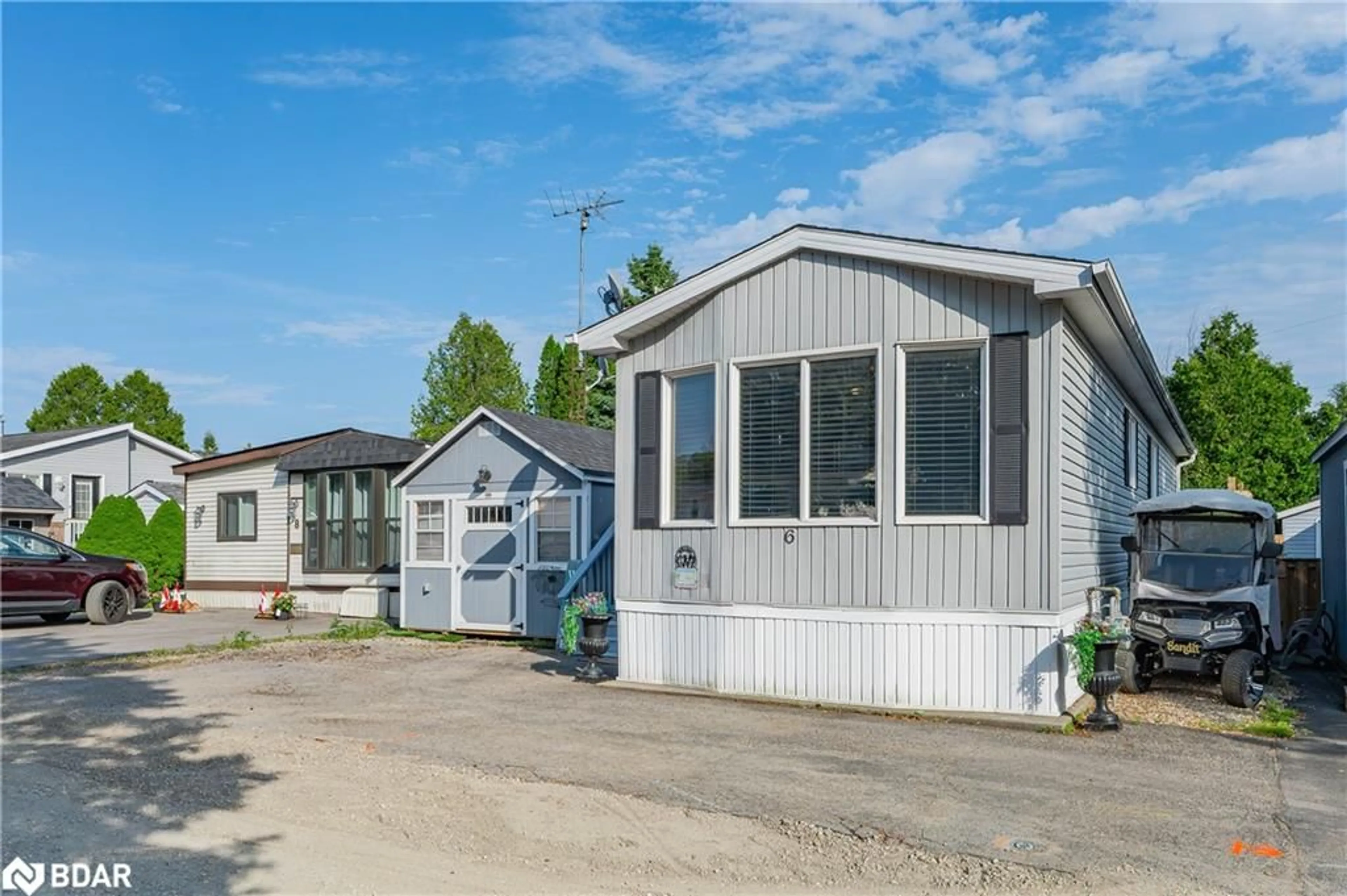 Home with vinyl exterior material, street for 6 Water Street Pvt, Puslinch Ontario N1H 6H9