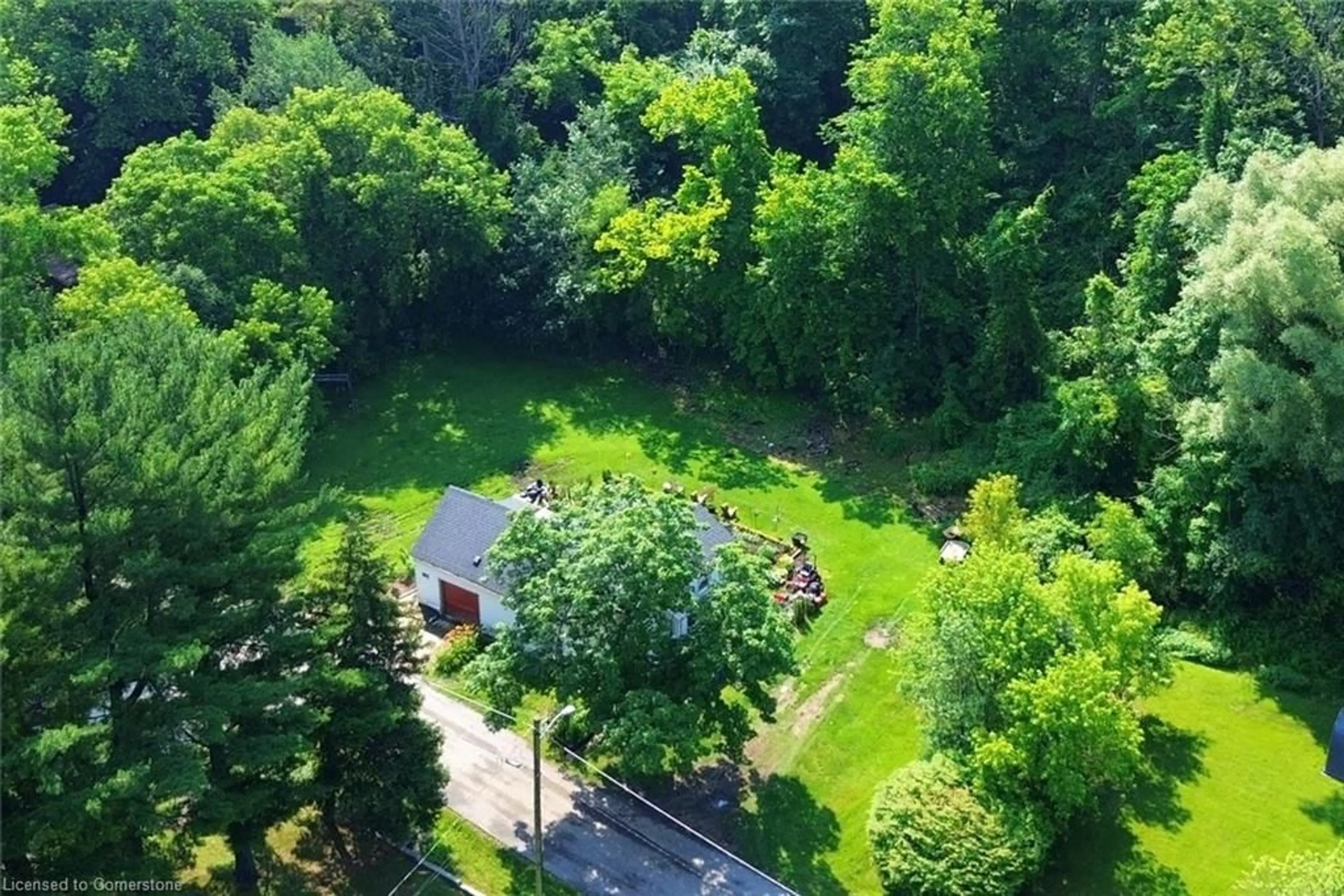 A pic from outside/outdoor area/front of a property/back of a property/a pic from drone, forest/trees view for 628 Mill St, Ancaster Ontario L9G 3G5