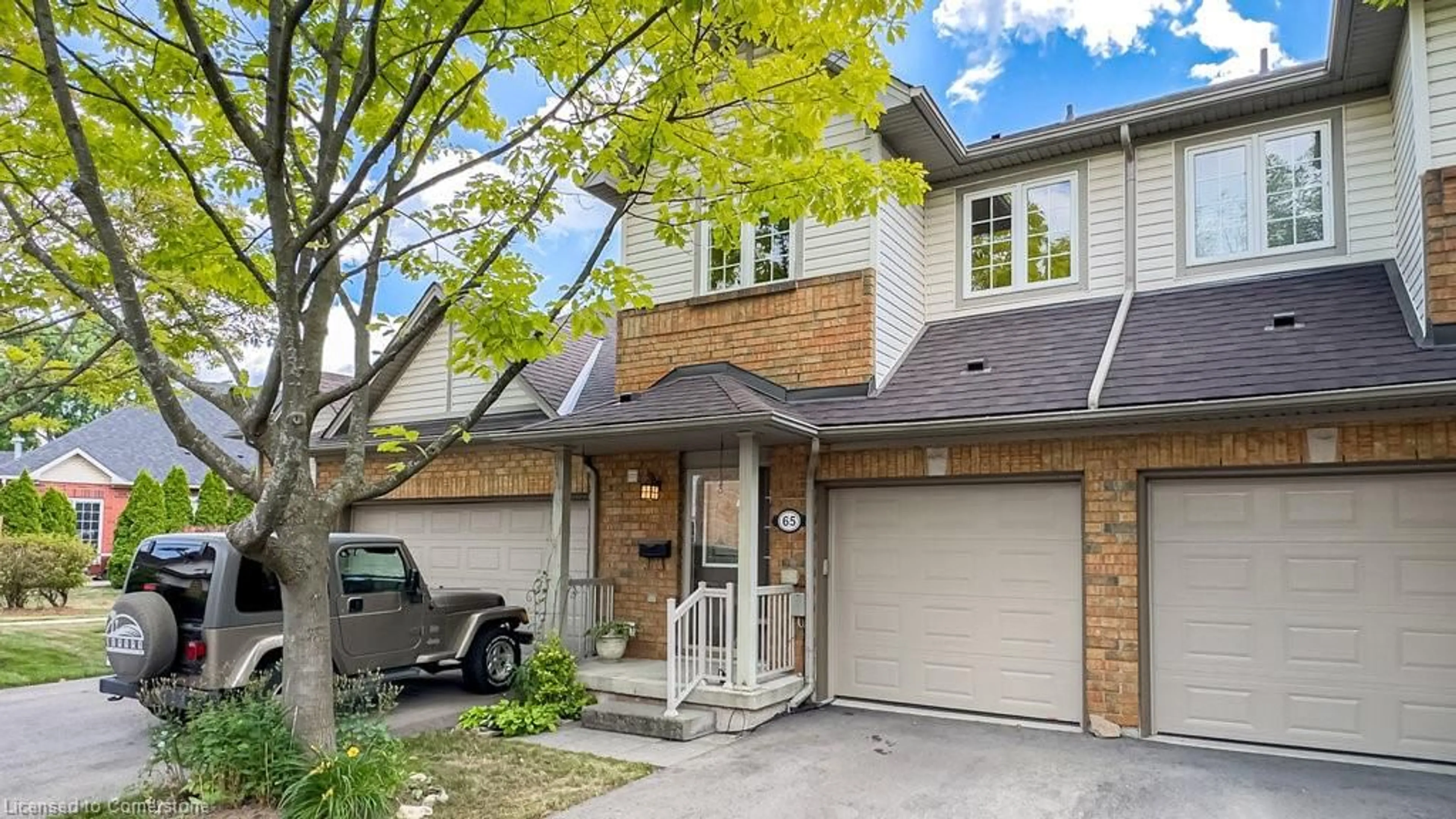Home with brick exterior material, street for 100 Beddoe St #65, Hamilton Ontario L8P 4Z2