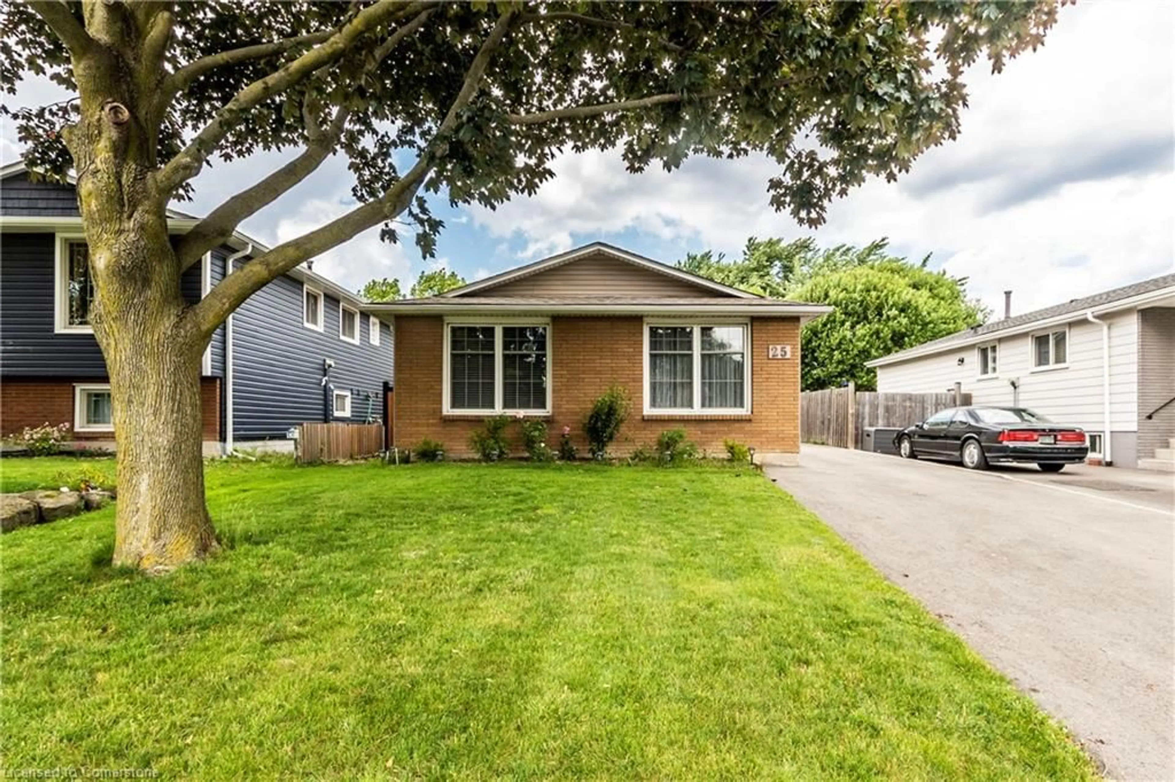 Home with brick exterior material, street for 25 Behan St, Hamilton Ontario L8T 4N5