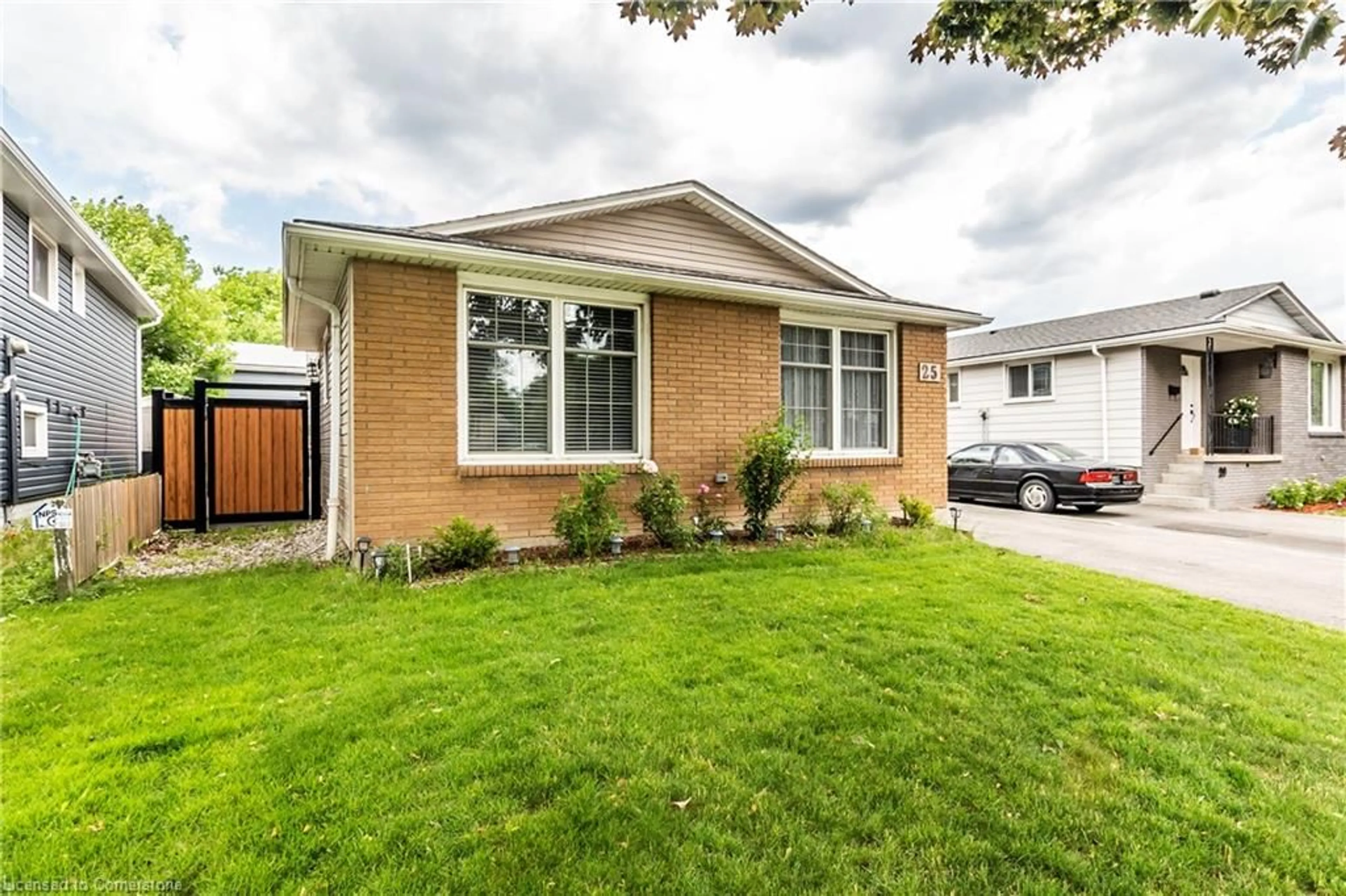 Home with brick exterior material, street for 25 Behan St, Hamilton Ontario L8T 4N5