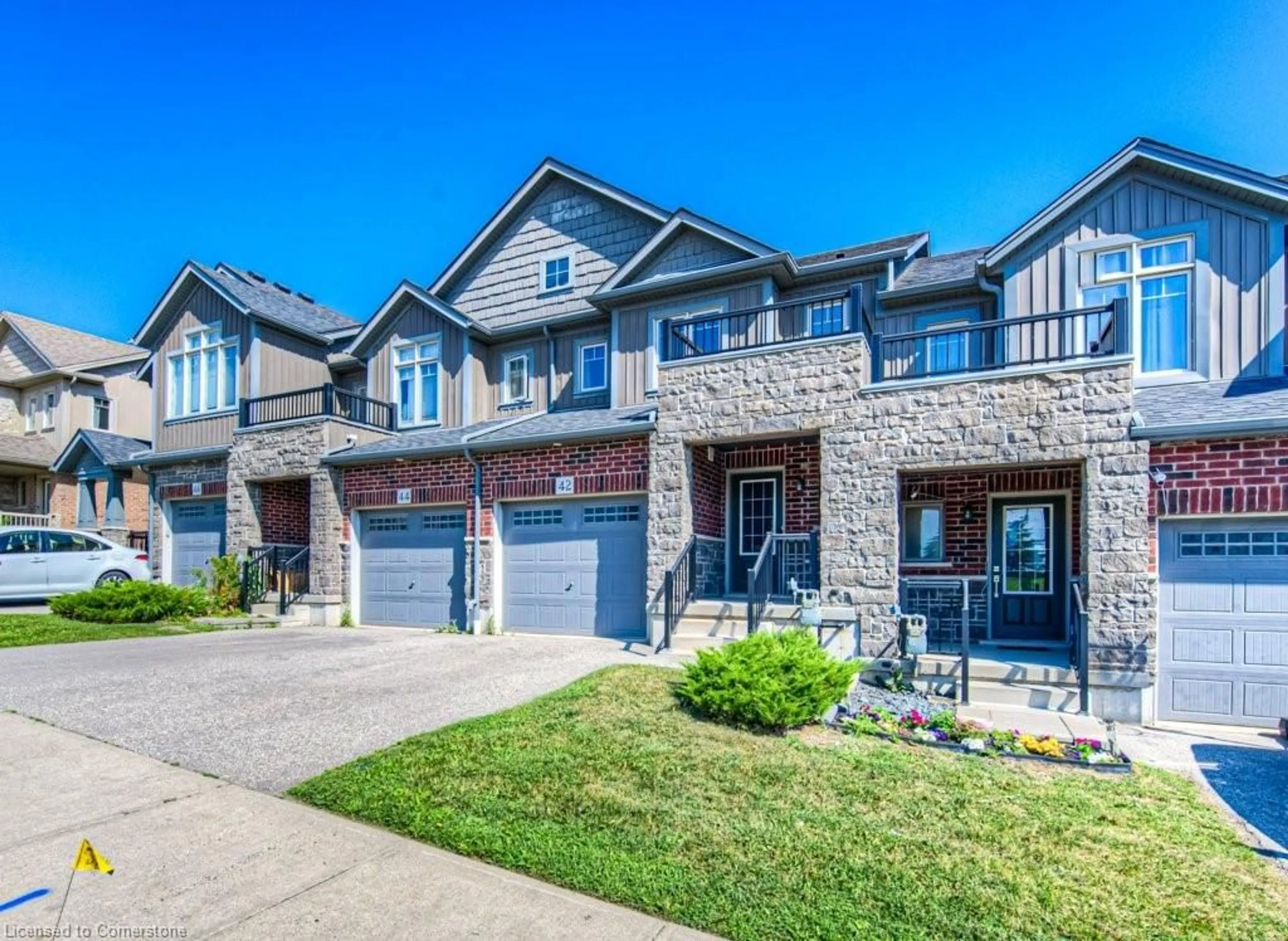 Home with brick exterior material, street for 42 Eliza Ave, Kitchener Ontario N2E 0B9