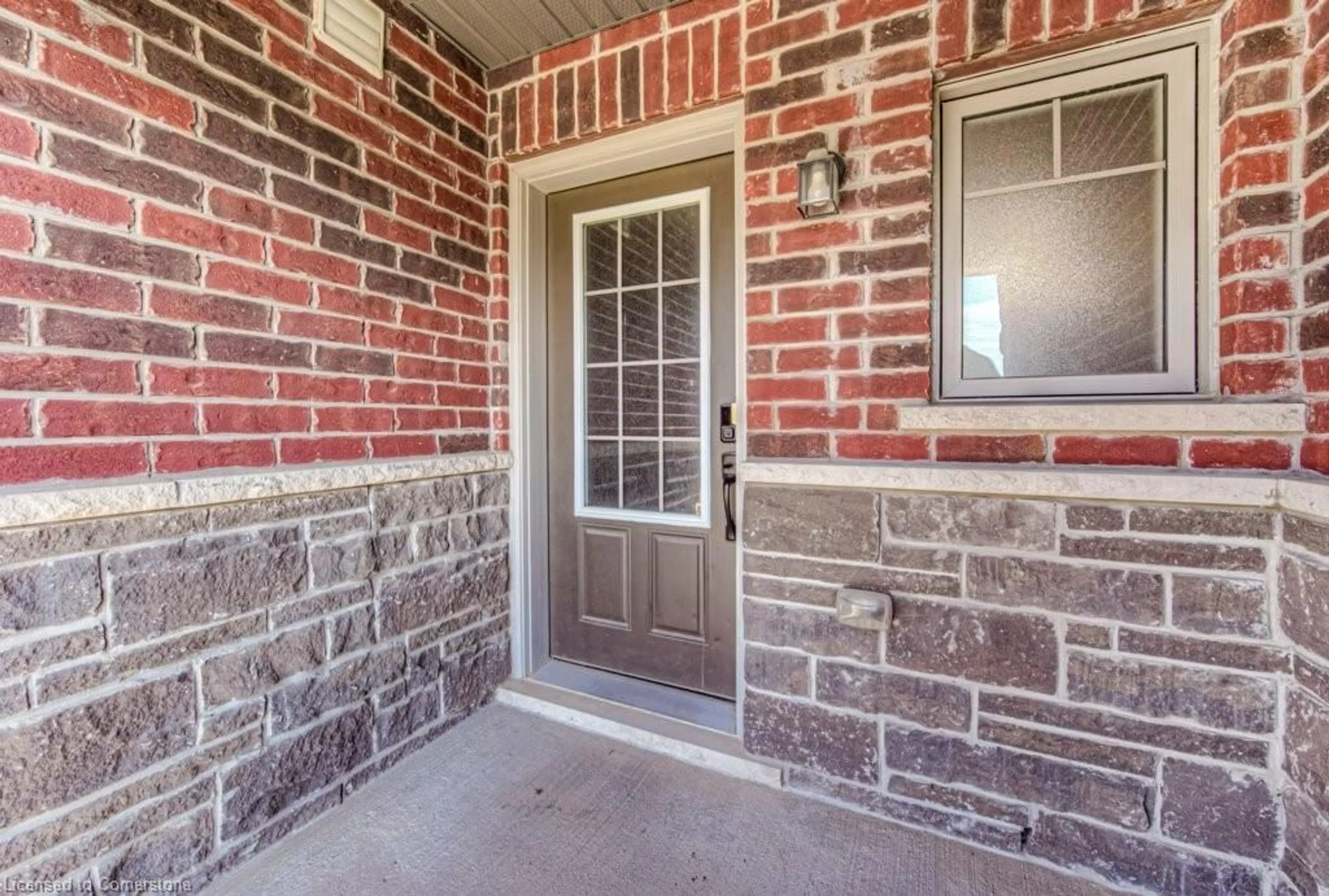 Home with brick exterior material, street for 42 Eliza Ave, Kitchener Ontario N2E 0B9