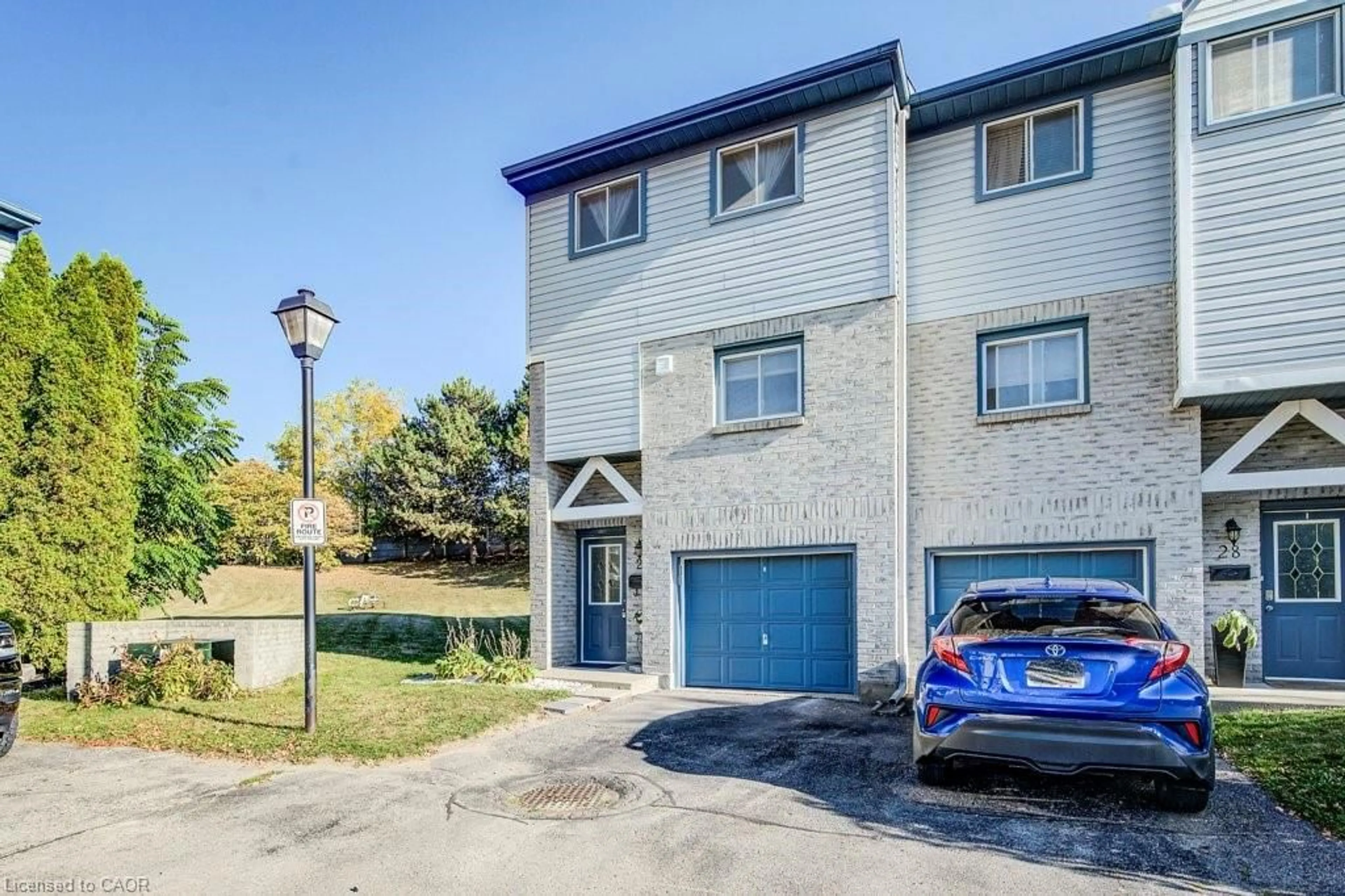 A pic from outside/outdoor area/front of a property/back of a property/a pic from drone, street for 589 Beechwood Dr #29, Waterloo Ontario N2T 2K9