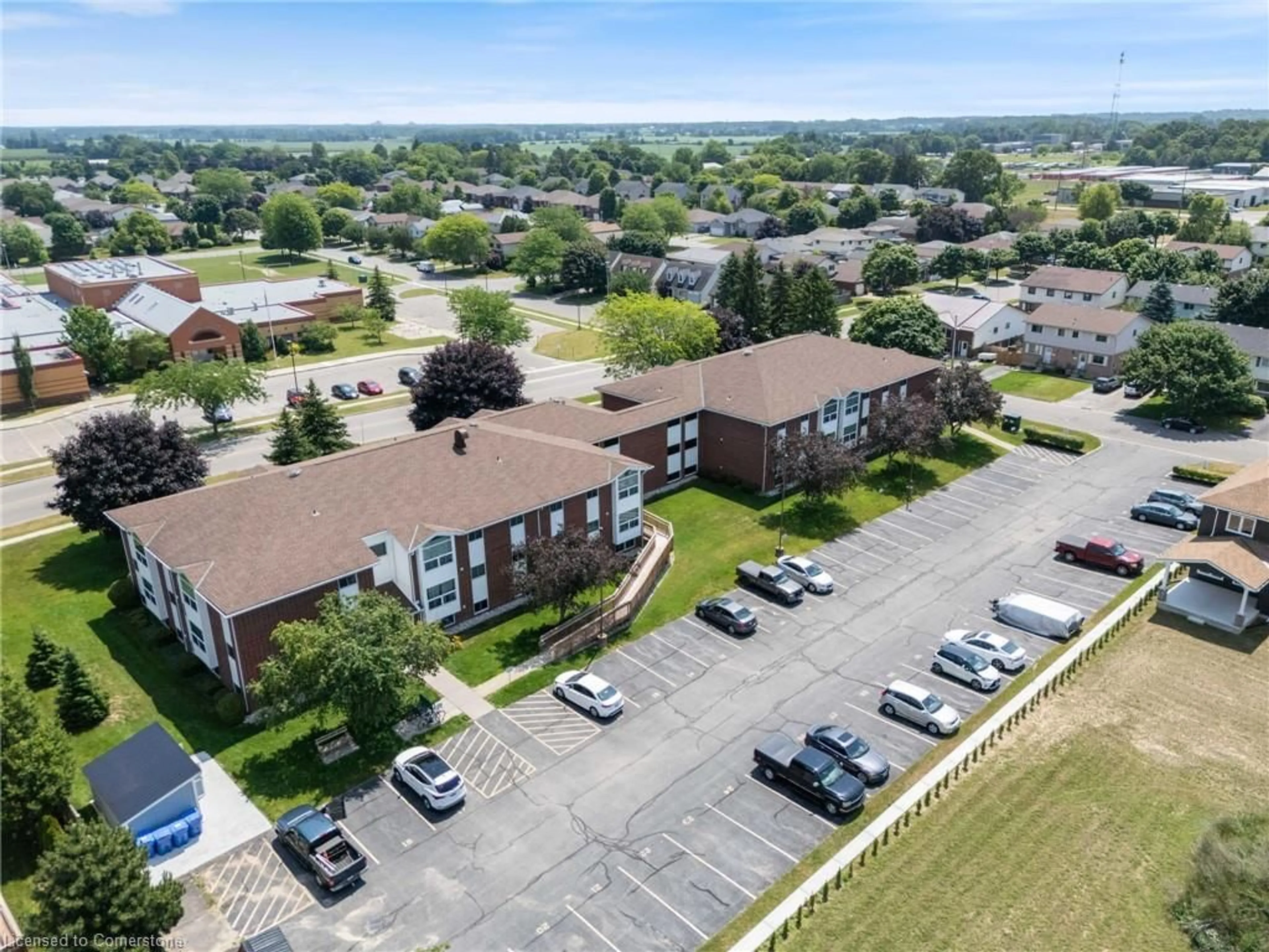 A pic from outside/outdoor area/front of a property/back of a property/a pic from drone, unknown for 60 Donly Dr #210, Simcoe Ontario N3Y 5K3