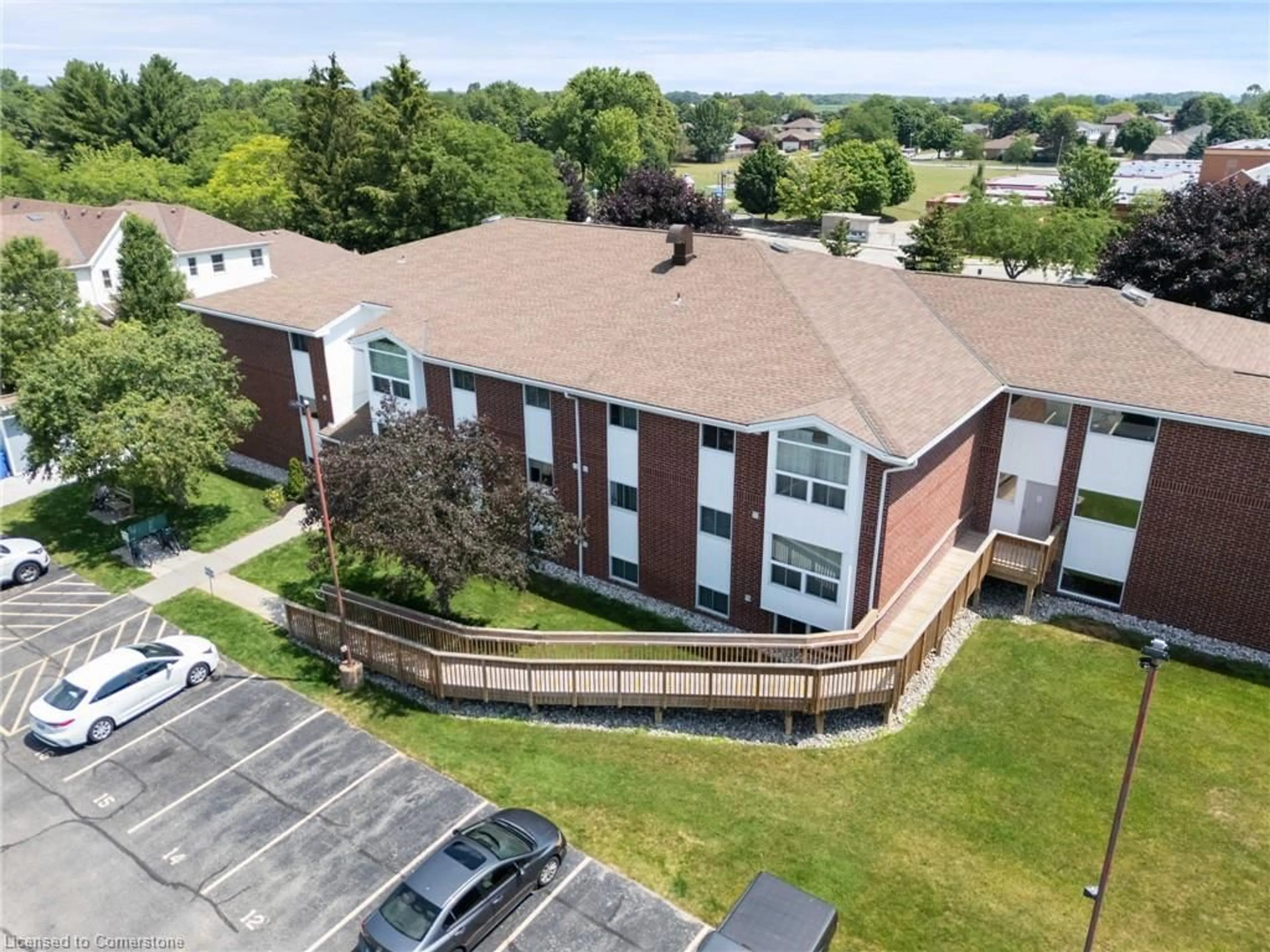 A pic from outside/outdoor area/front of a property/back of a property/a pic from drone, building for 60 Donly Dr #210, Simcoe Ontario N3Y 5K3