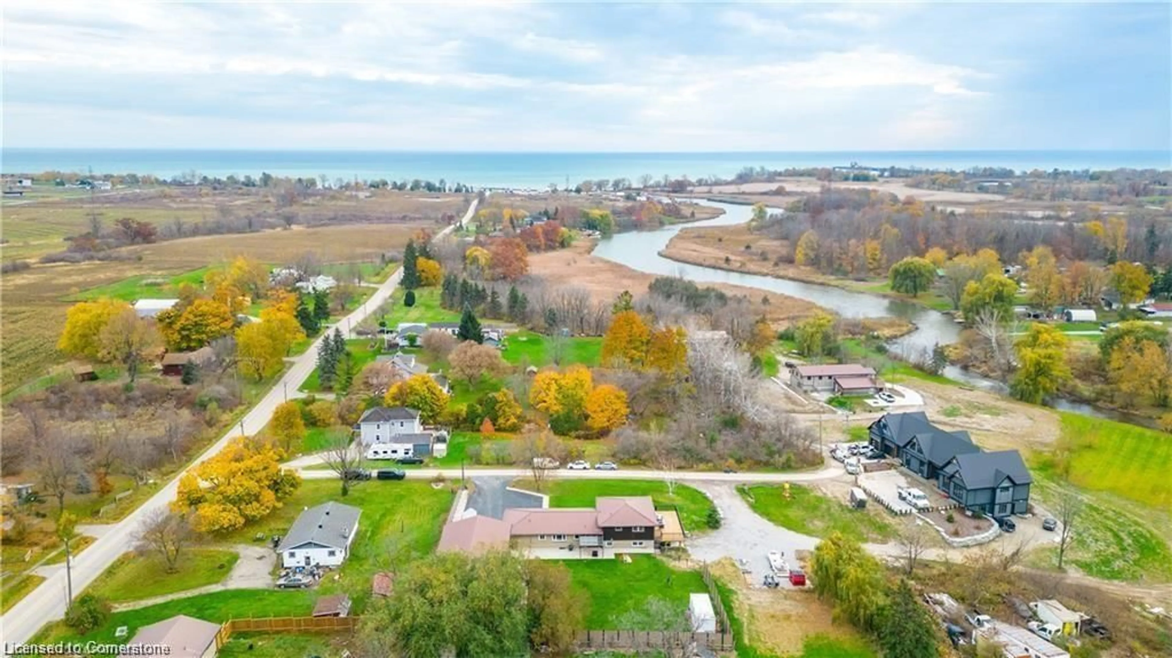 A pic from outside/outdoor area/front of a property/back of a property/a pic from drone, water/lake/river/ocean view for 4006 Queen St, Nanticoke Ontario N0A 1L0