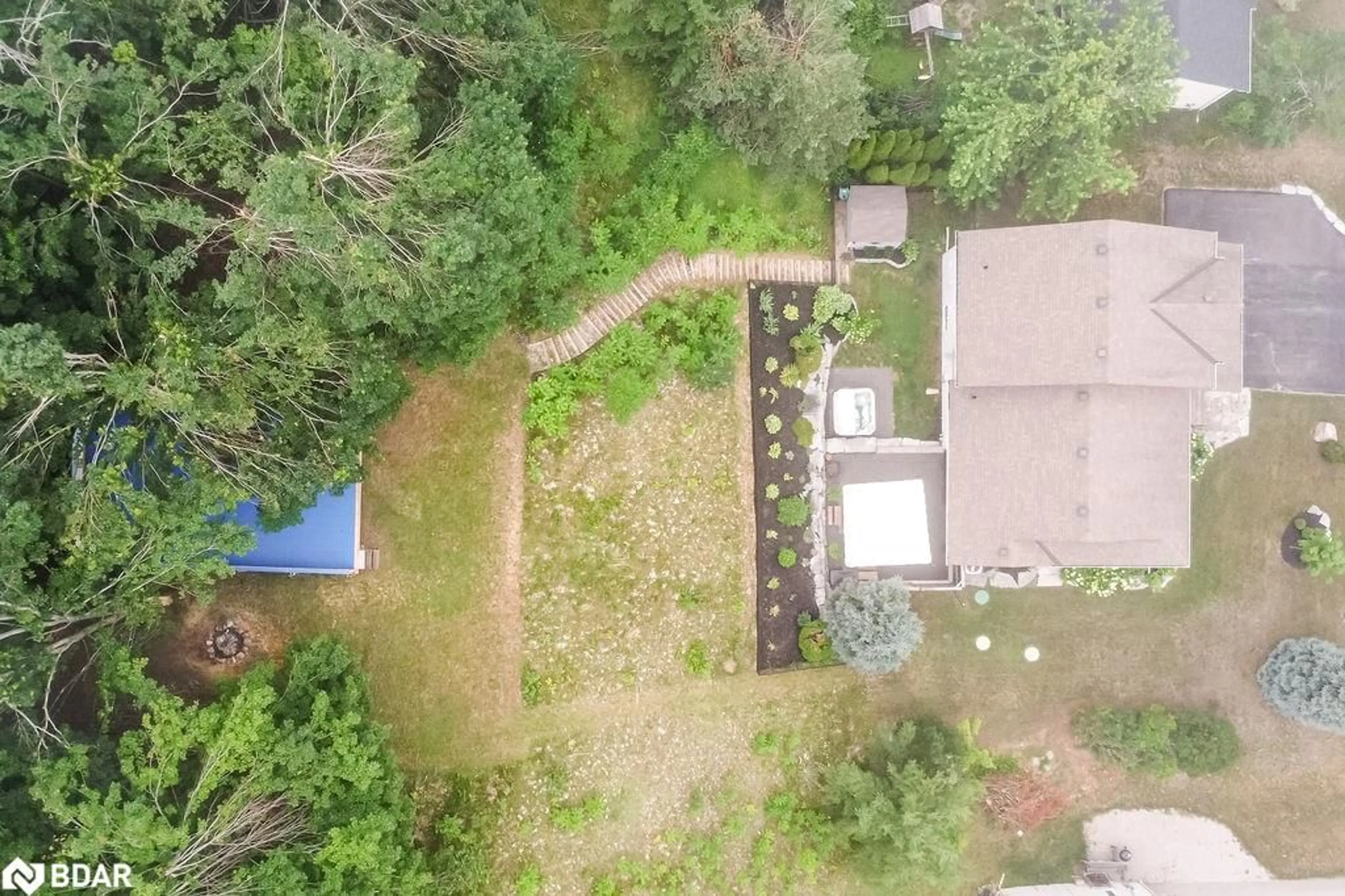 A pic from outside/outdoor area/front of a property/back of a property/a pic from drone, forest/trees view for 24 Ironwood Trail, Oro-Medonte Ontario L0K 1E0