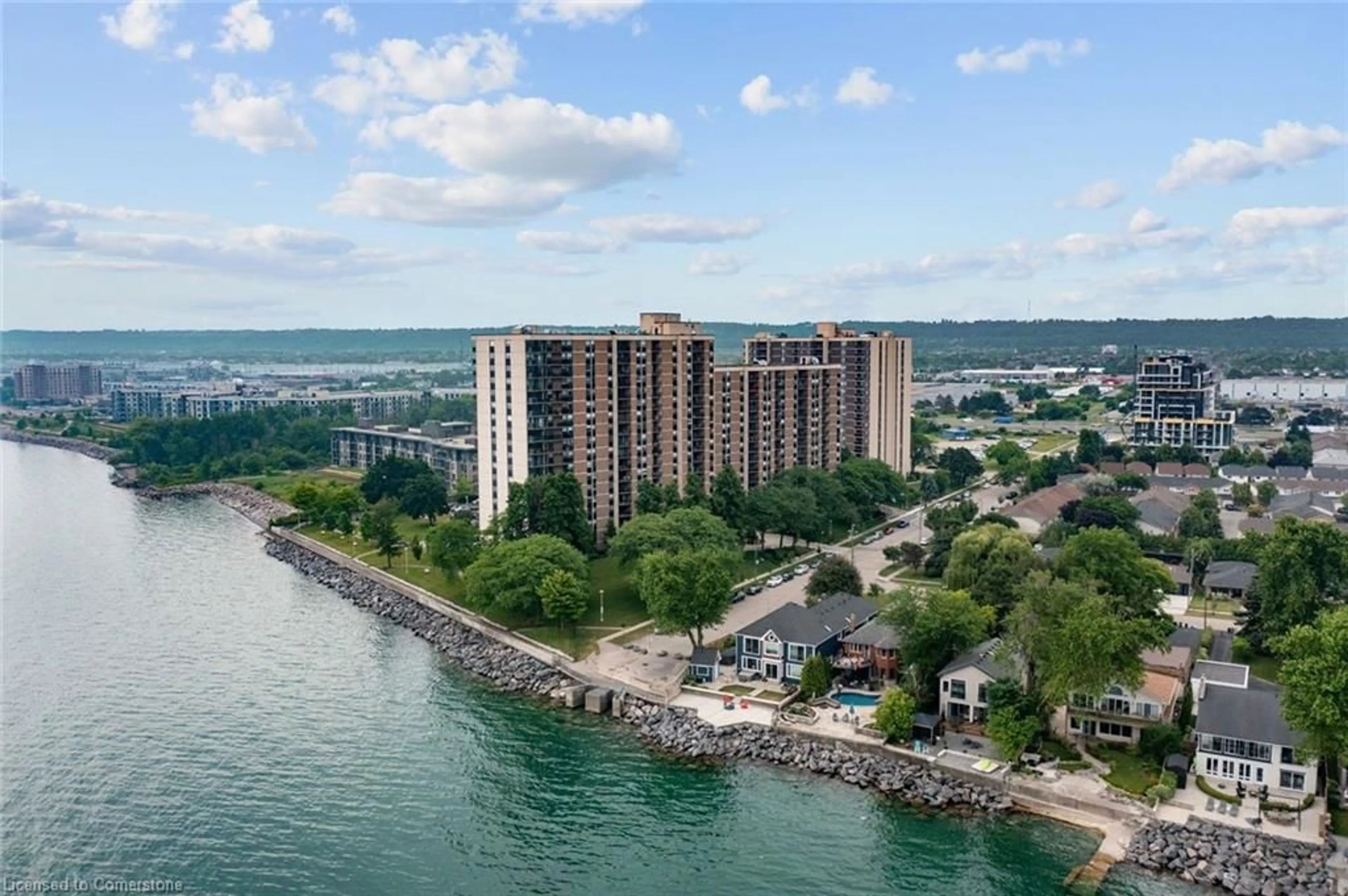 A pic from outside/outdoor area/front of a property/back of a property/a pic from drone, water/lake/river/ocean view for 500 Greens Rd #218, Hamilton Ontario L8E 3M6
