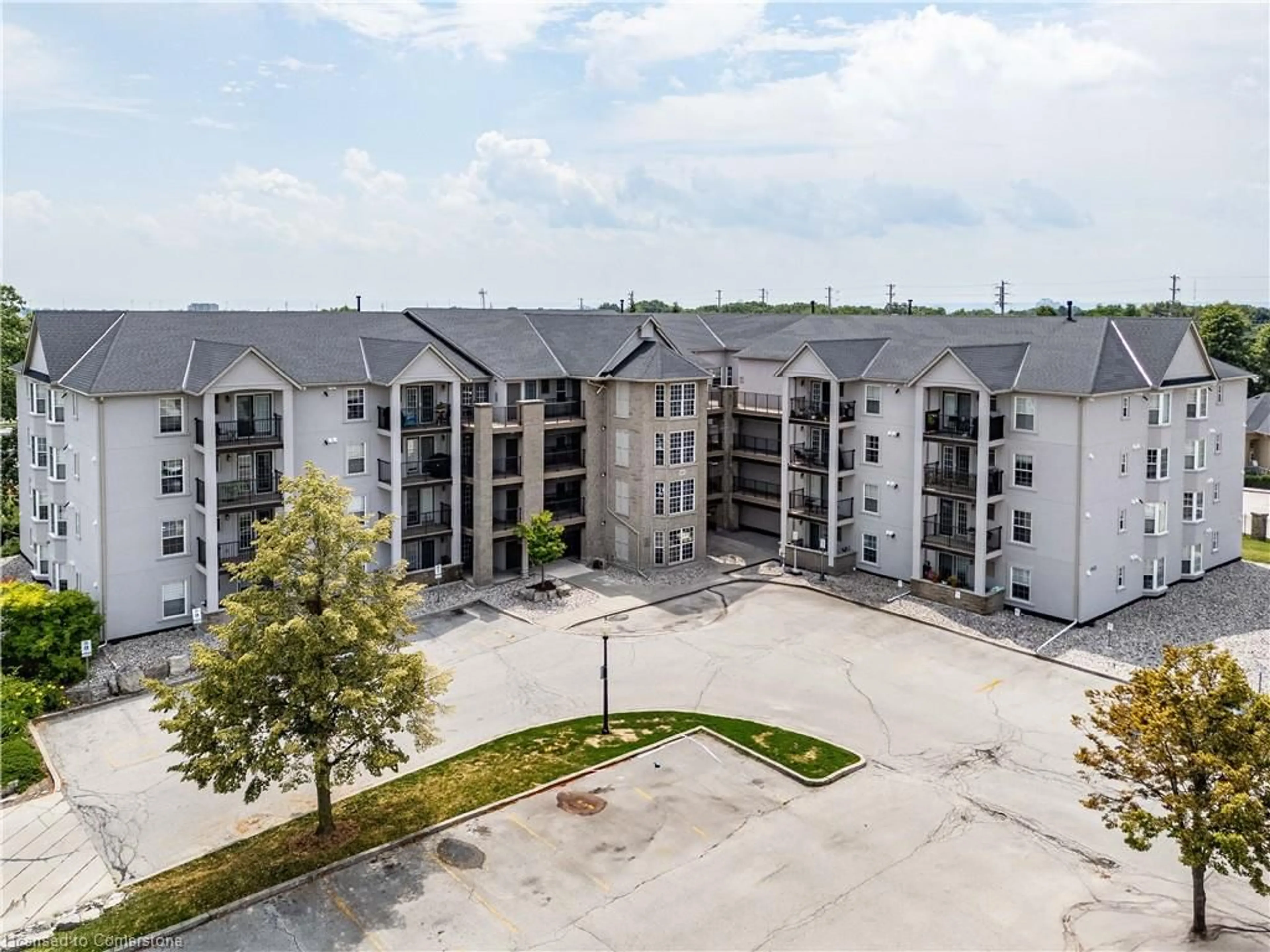 A pic from outside/outdoor area/front of a property/back of a property/a pic from drone, building for 1411 Walkers Line #409, Burlington Ontario L7M 4P5