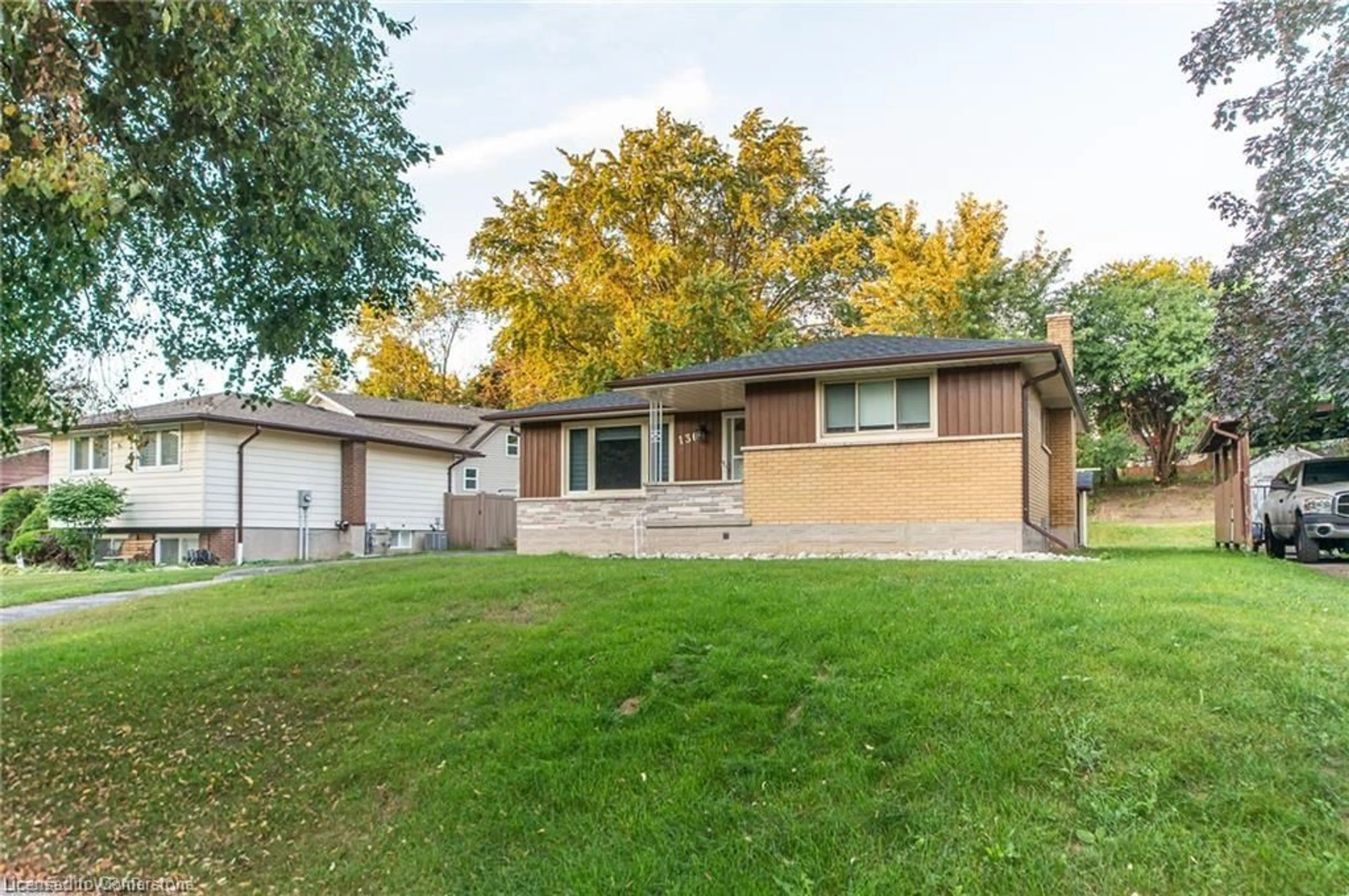 Home with brick exterior material, street for 136 Macgregor Cres, Waterloo Ontario N2J 3W9