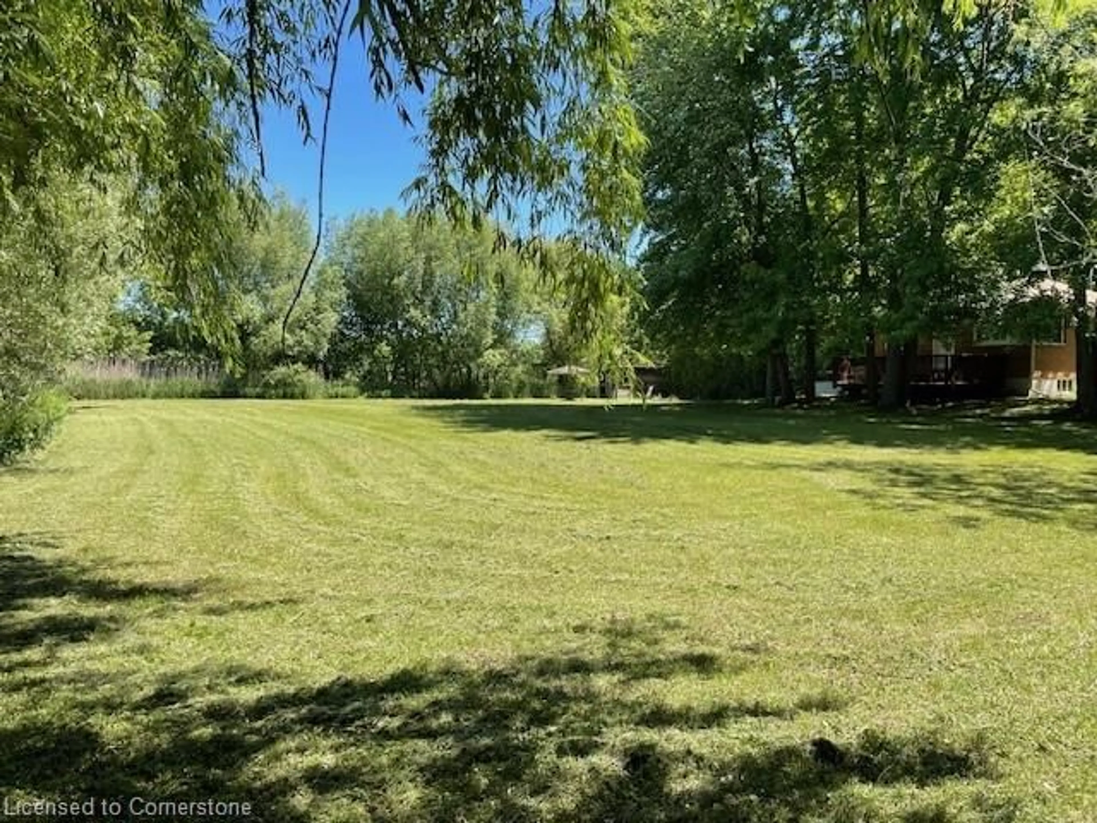 A pic from outside/outdoor area/front of a property/back of a property/a pic from drone, forest/trees view for 1027 Chapman St, Innisfil Ontario L0L 1W0