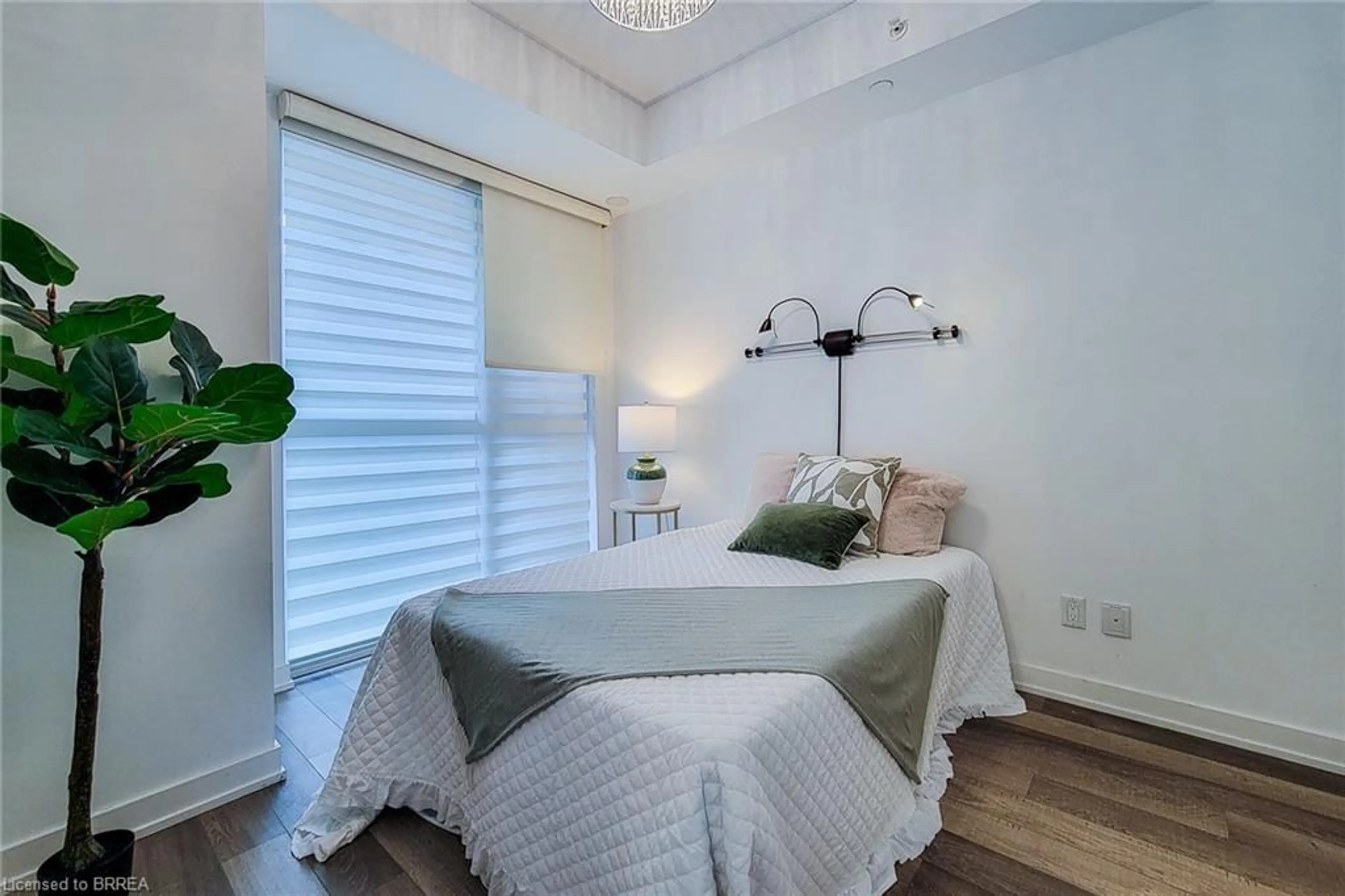 Bedroom with bed, unknown for 5240 Dundas St #B215, Burlington Ontario L7L 0J6