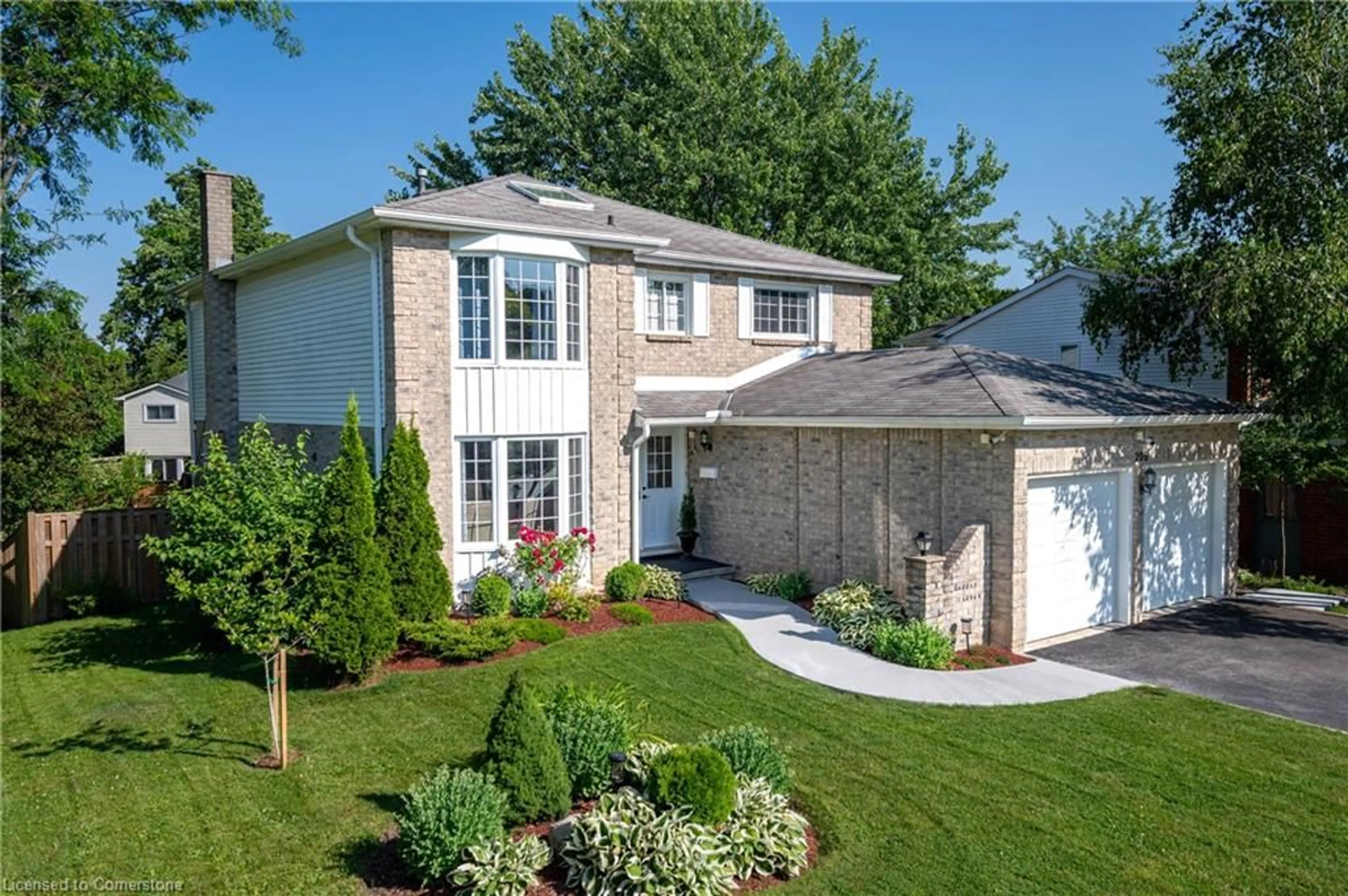 Home with brick exterior material, street for 206 Westvale Dr, Waterloo Ontario N2T 1C3