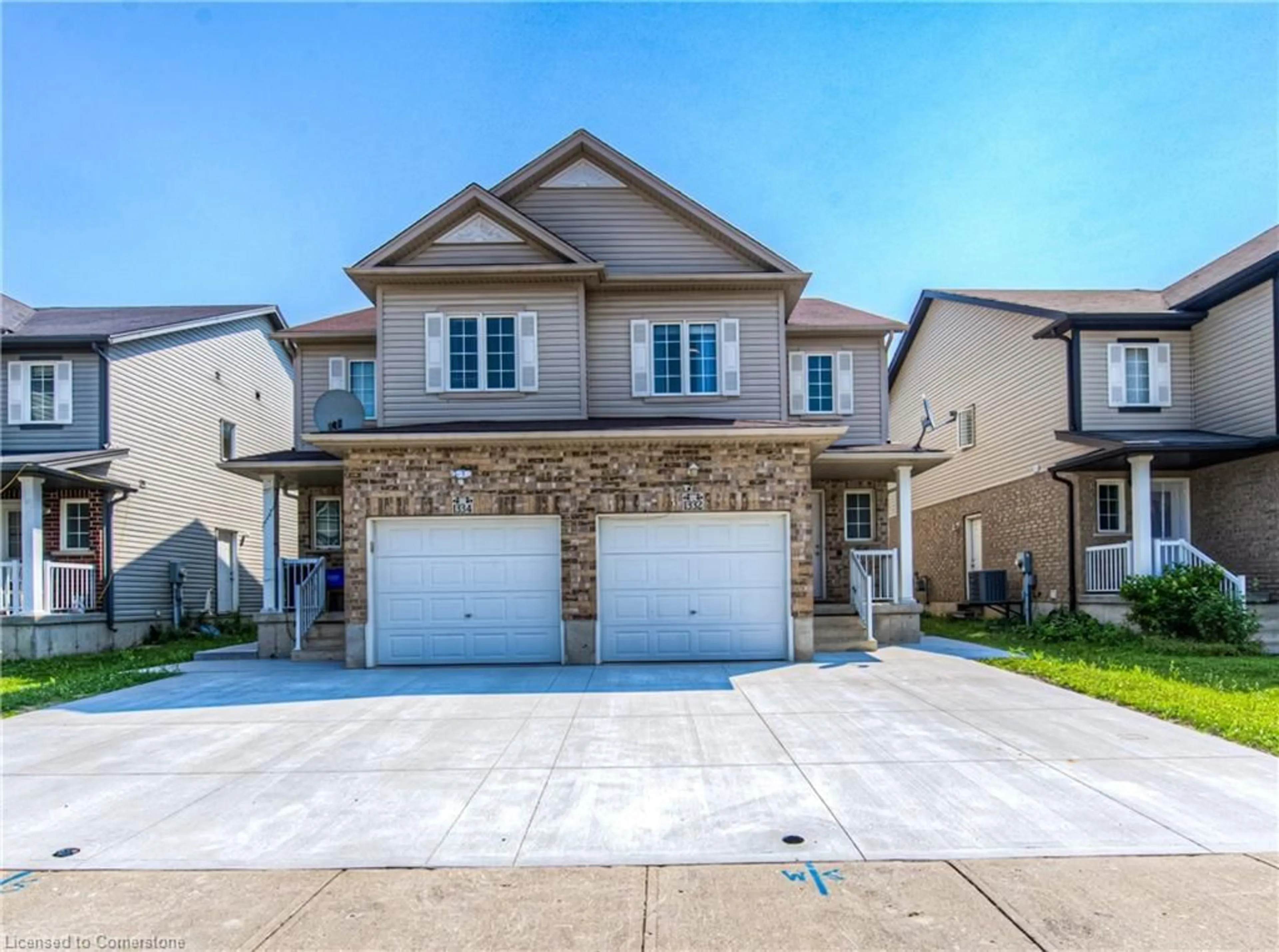 Home with brick exterior material, street for 1332 Countrystone Dr, Kitchener Ontario N2N 3R9