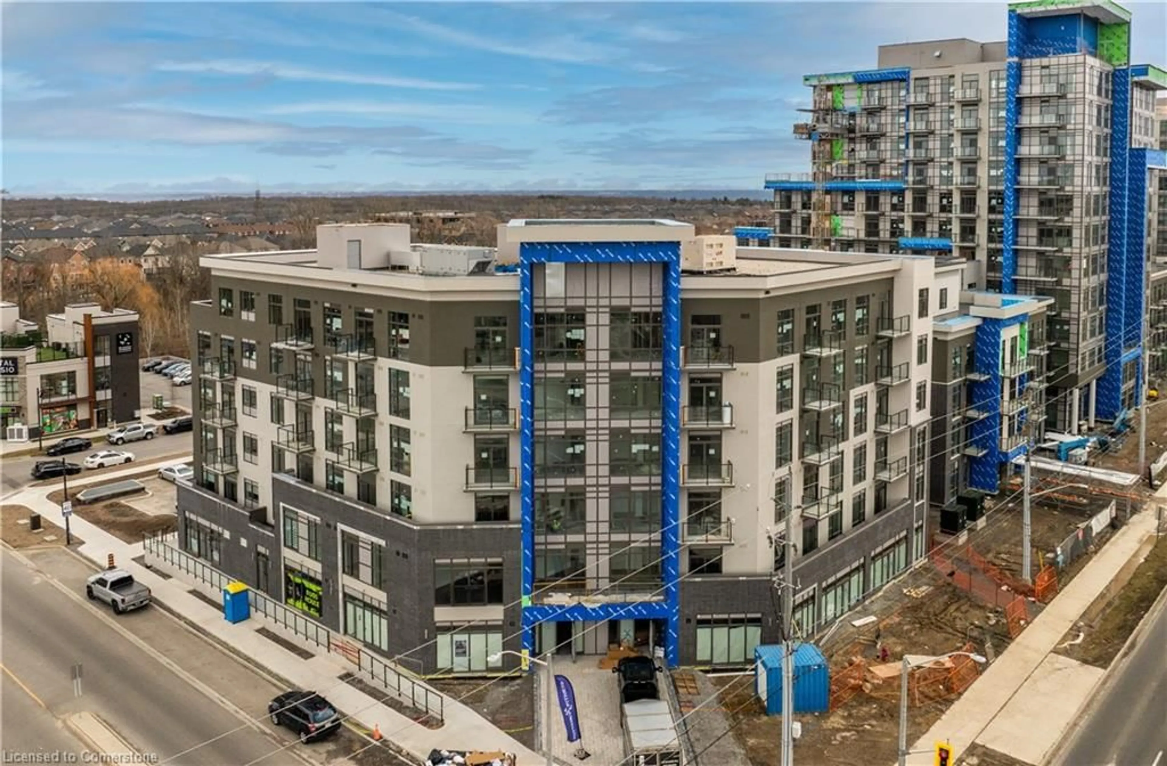 A pic from outside/outdoor area/front of a property/back of a property/a pic from drone, city buildings view from balcony for 10 Mallard Trail #335, Waterdown Ontario L8B 2A7