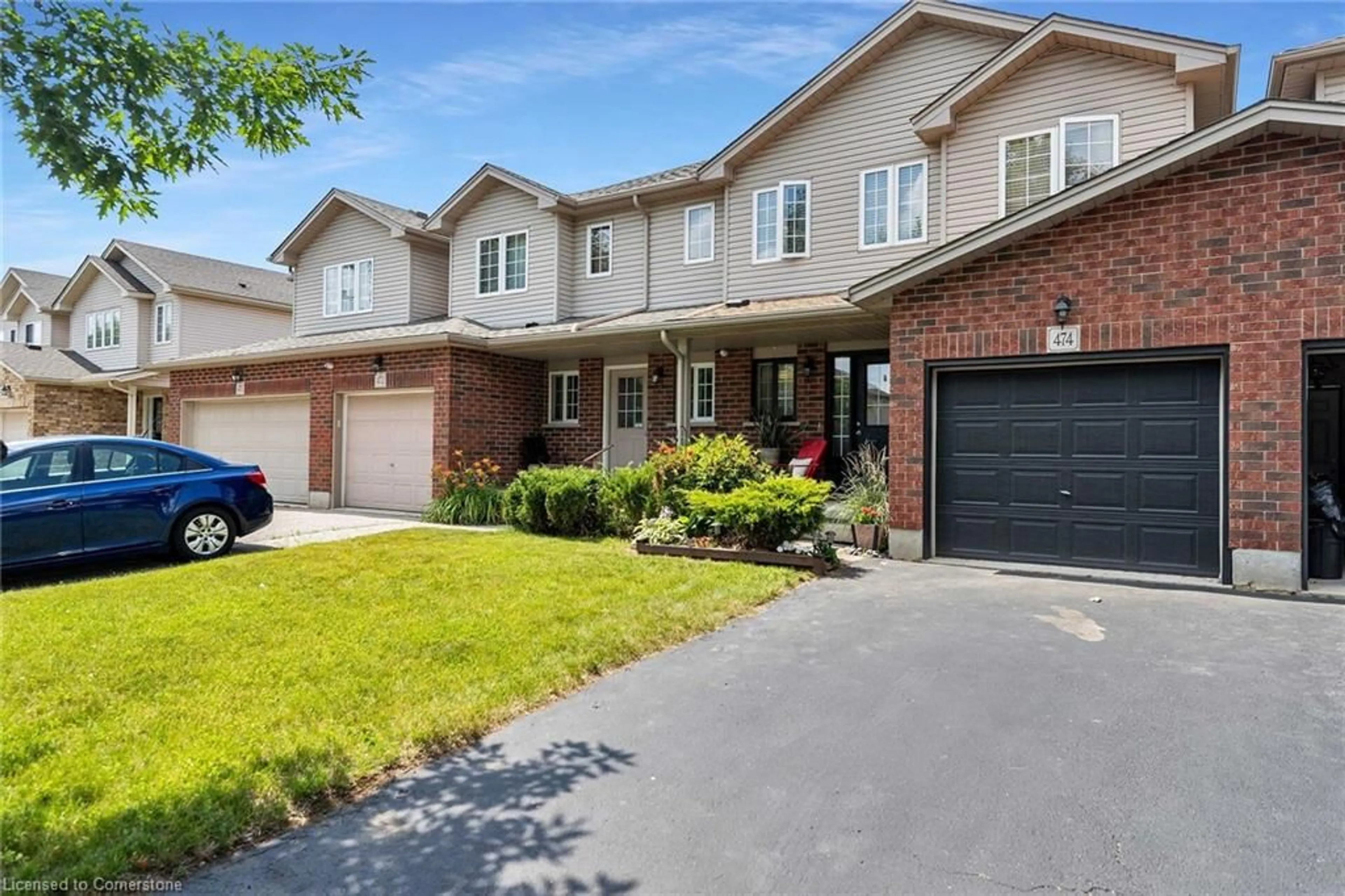 Home with brick exterior material, street for 474 Colt St, Waterloo Ontario N2K 4N8