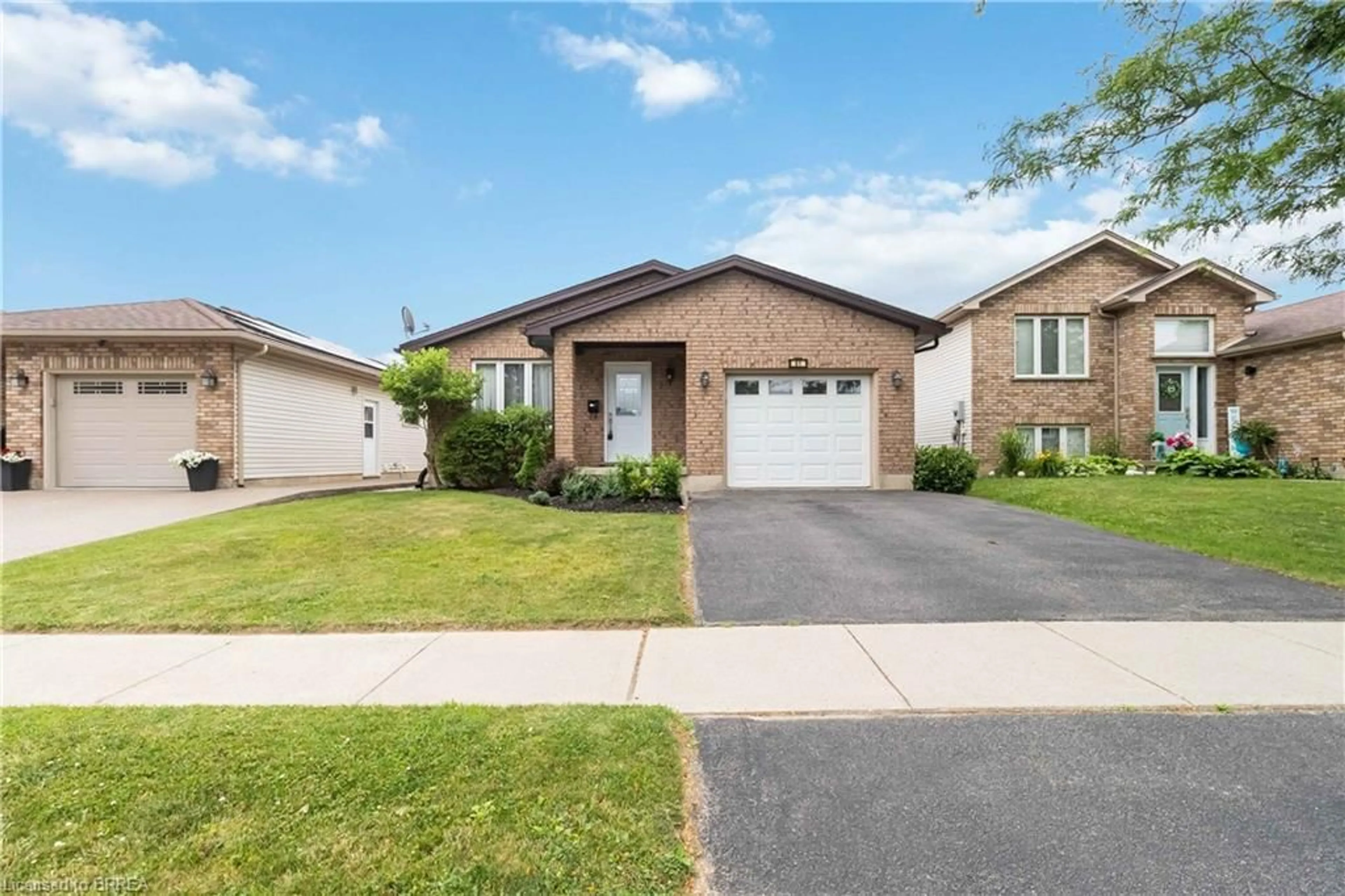 Home with brick exterior material, street for 61 St. Patrick's Dr, Brantford Ontario N3T 6L4