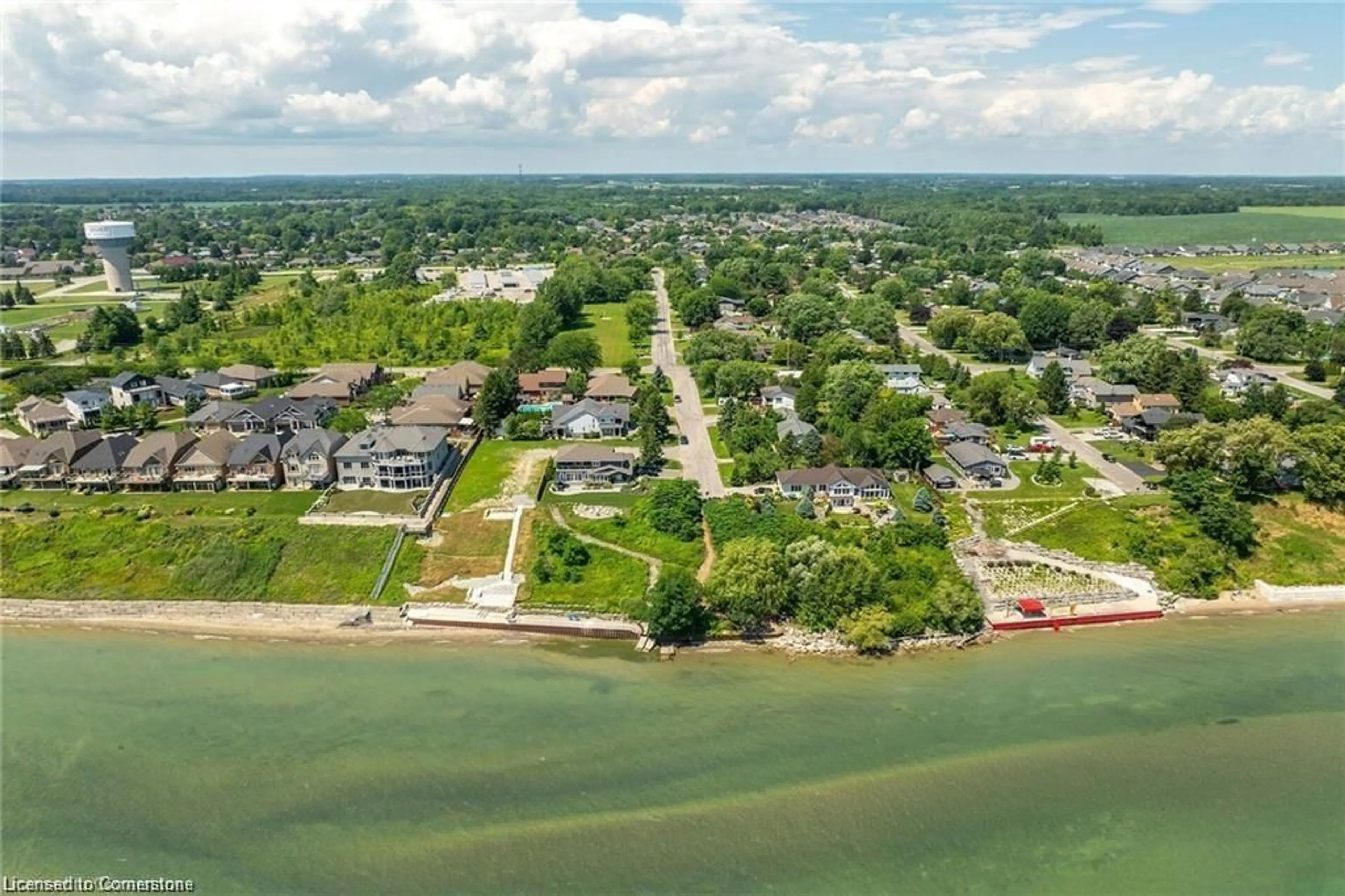 A pic from outside/outdoor area/front of a property/back of a property/a pic from drone, water/lake/river/ocean view for 24 Woodhouse Ave, Port Dover Ontario N0A 1N8