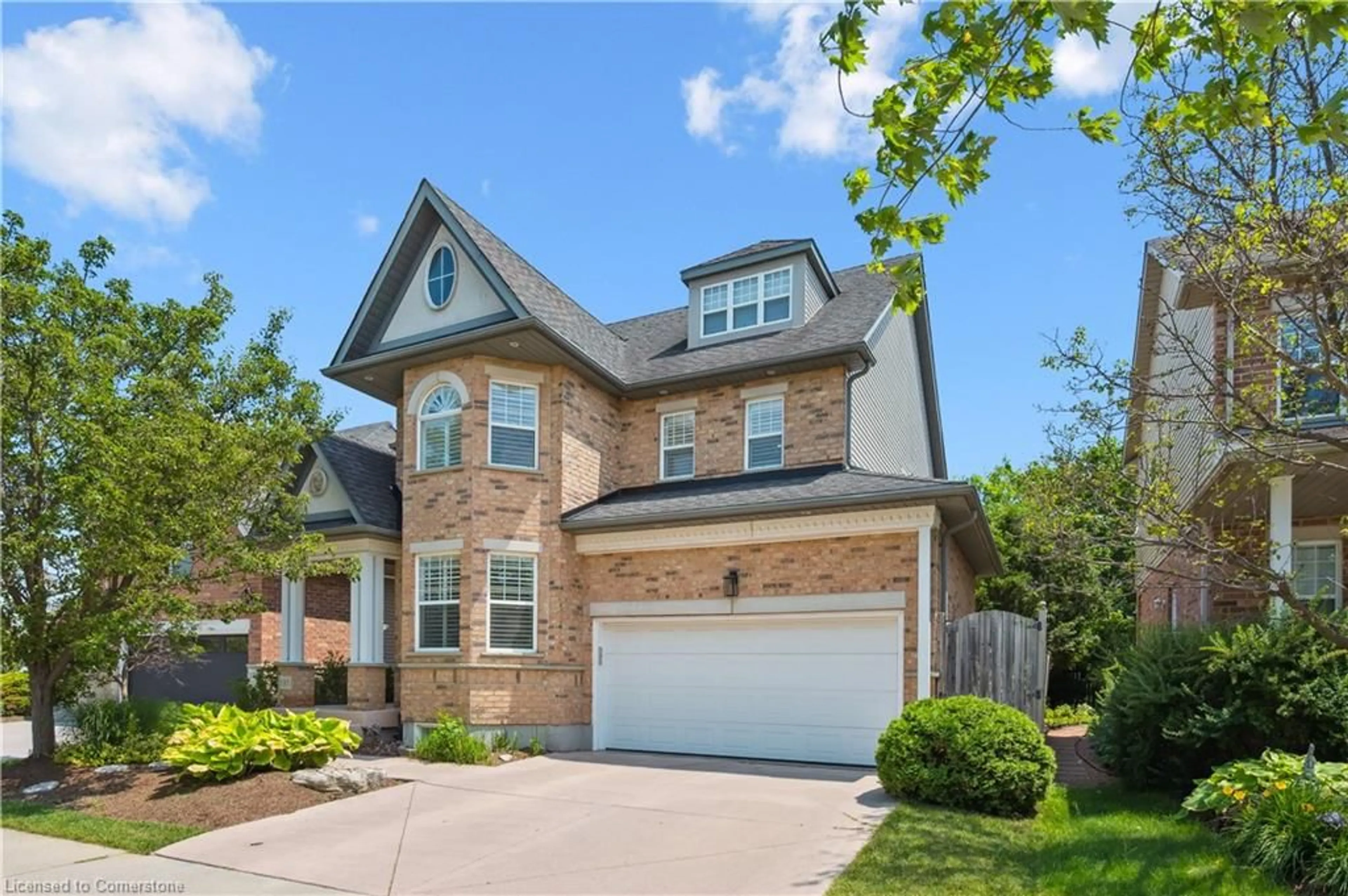 Home with brick exterior material, street for 135 Hawkswood Dr, Kitchener Ontario N2K 4J4