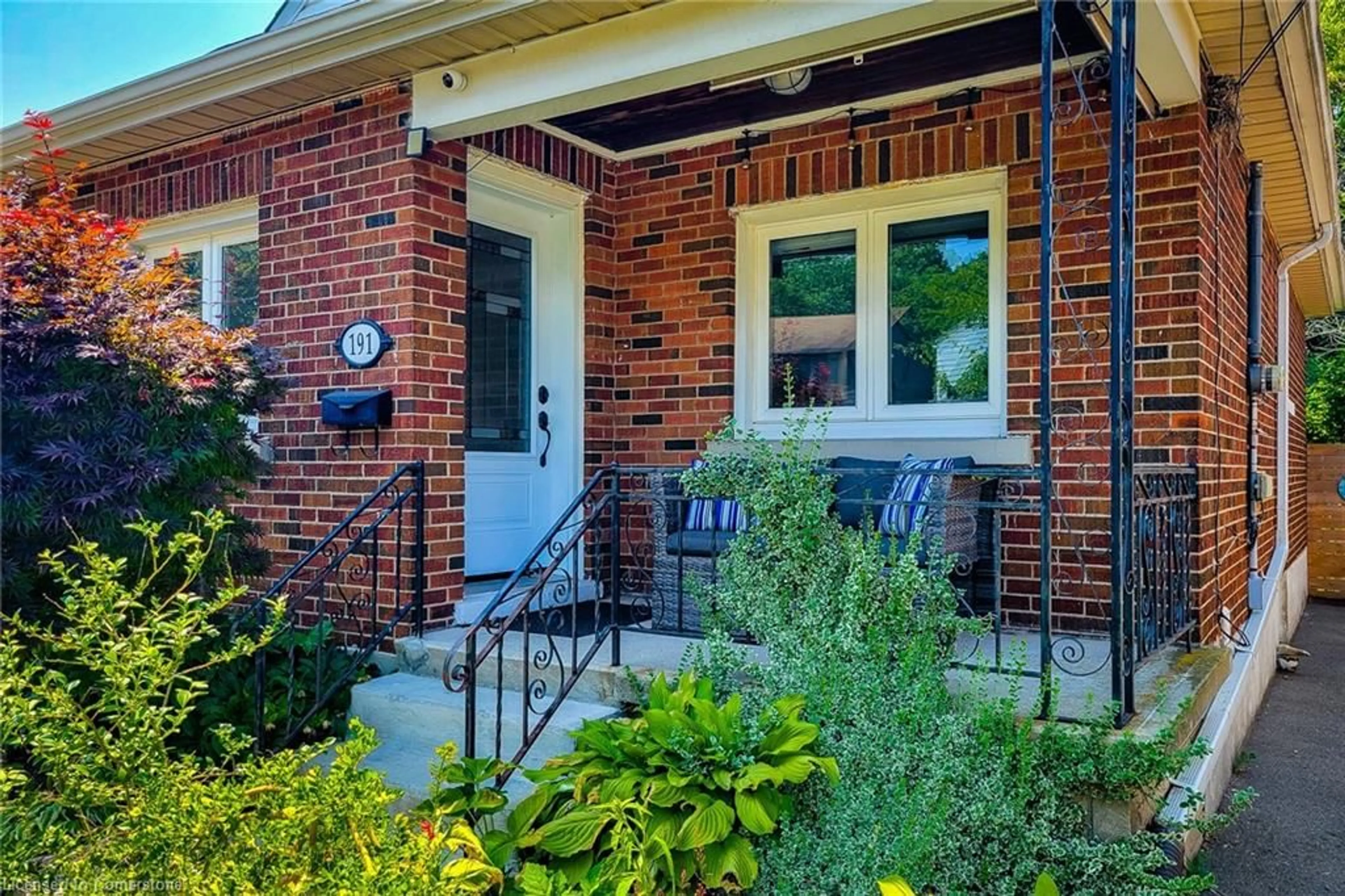 Home with brick exterior material, street for 191 Paradise Rd, Hamilton Ontario L8S 3T2