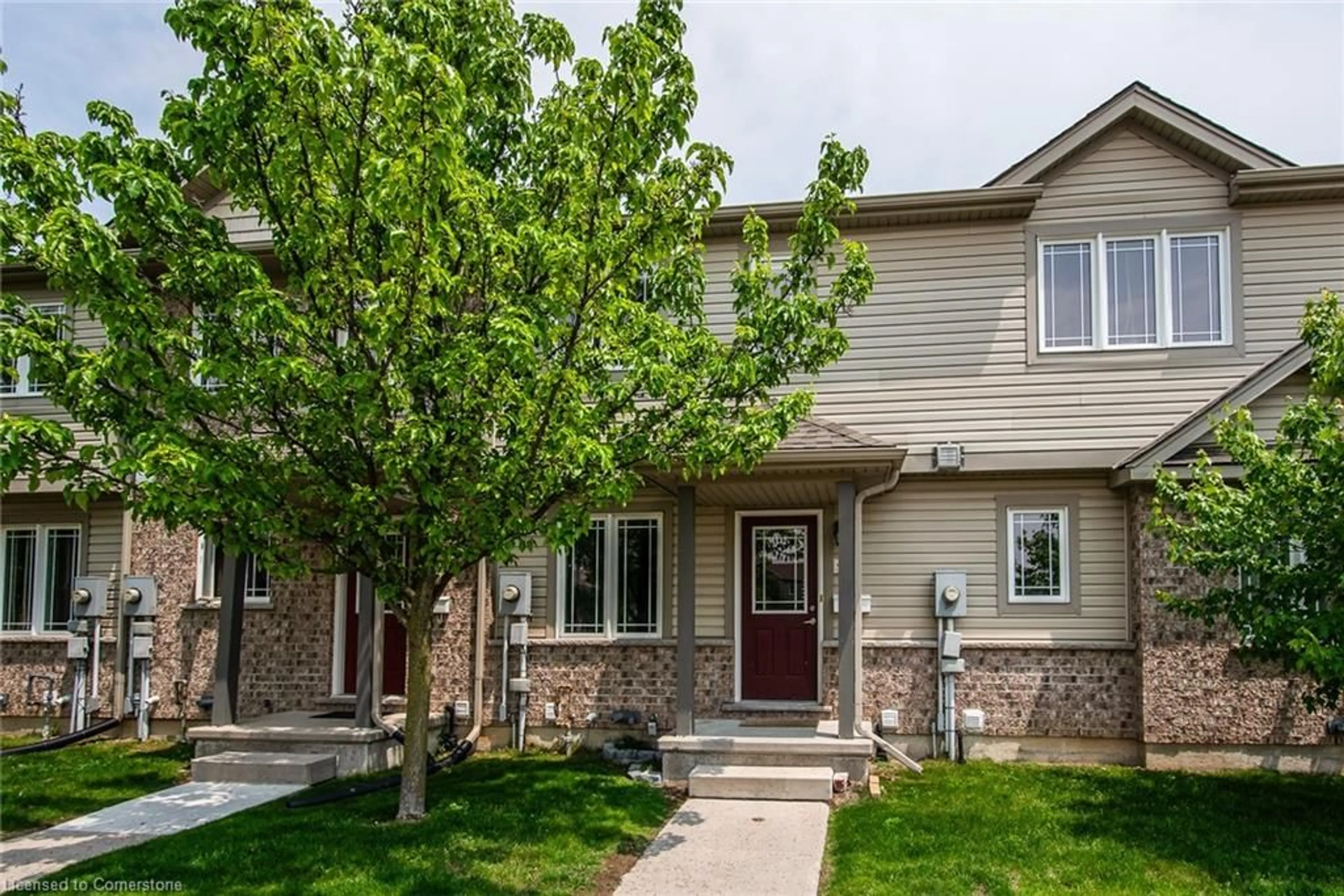 Home with vinyl exterior material, street for 535 Windflower Cres #51, Kitchener Ontario N2E 4L7
