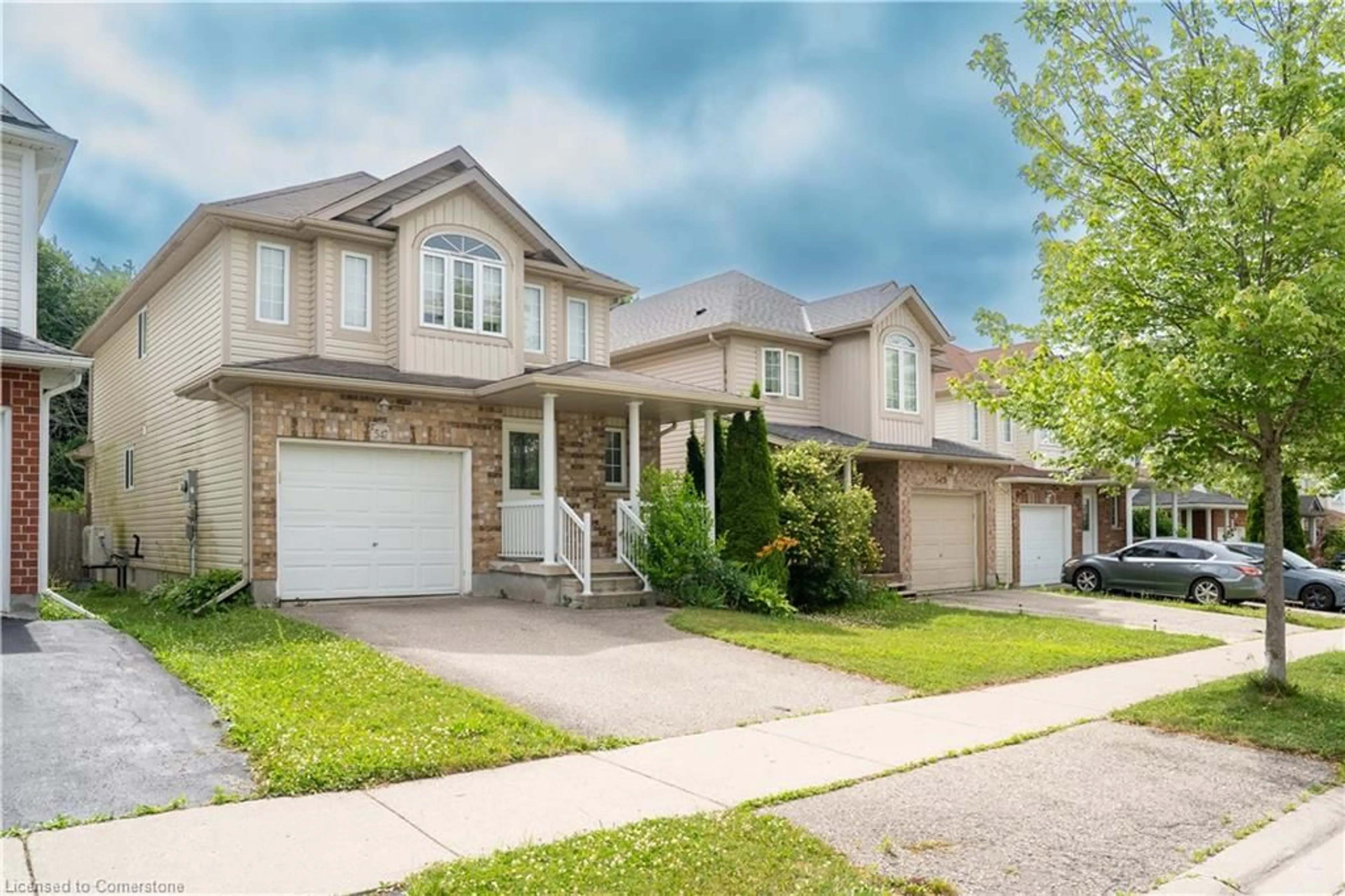 Home with brick exterior material, street for 547 Blue Beech Blvd, Waterloo Ontario N2V 2T4