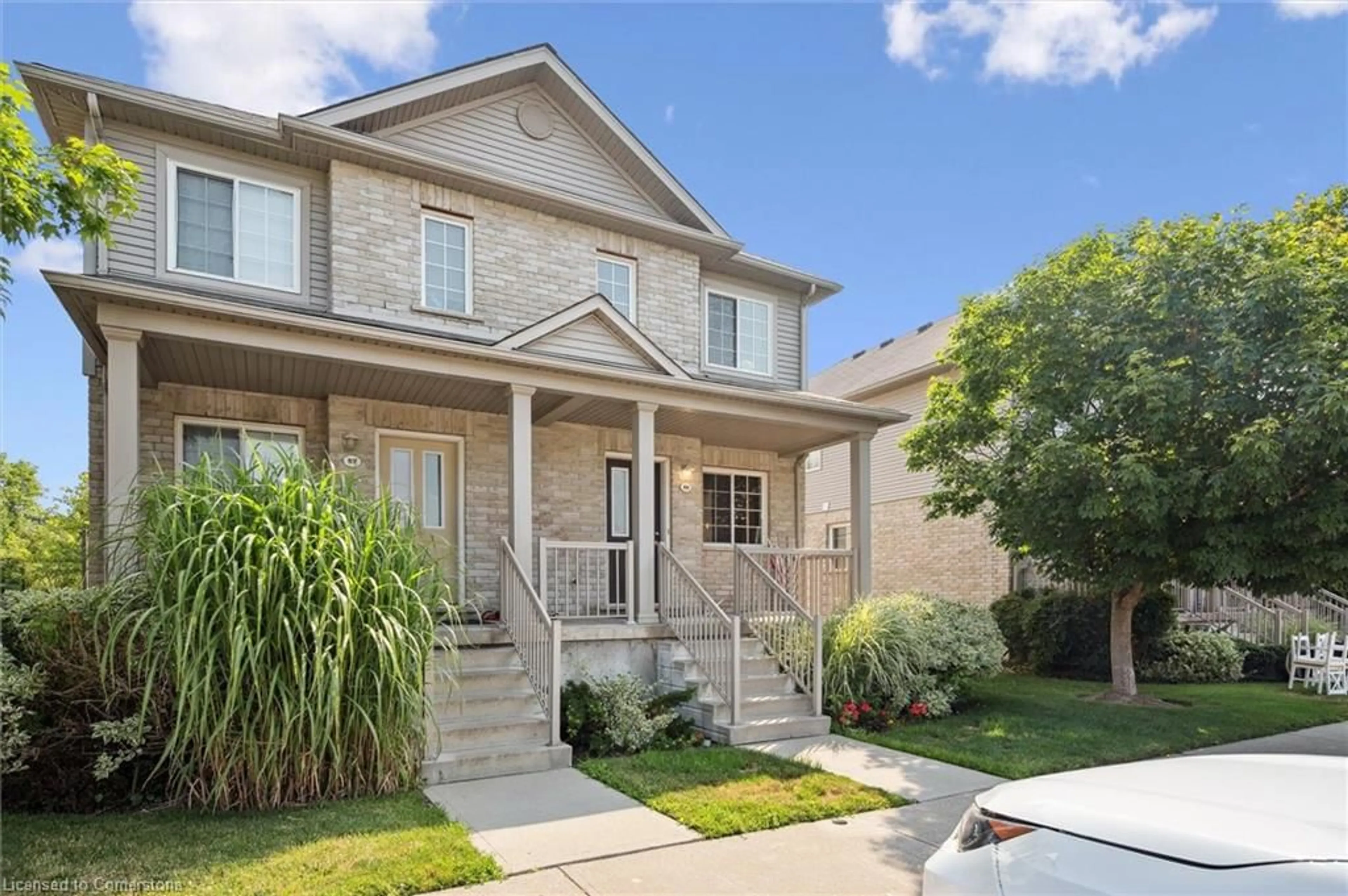 Home with brick exterior material, street for 35 Mountford Dr #59, Guelph Ontario N1E 0G6
