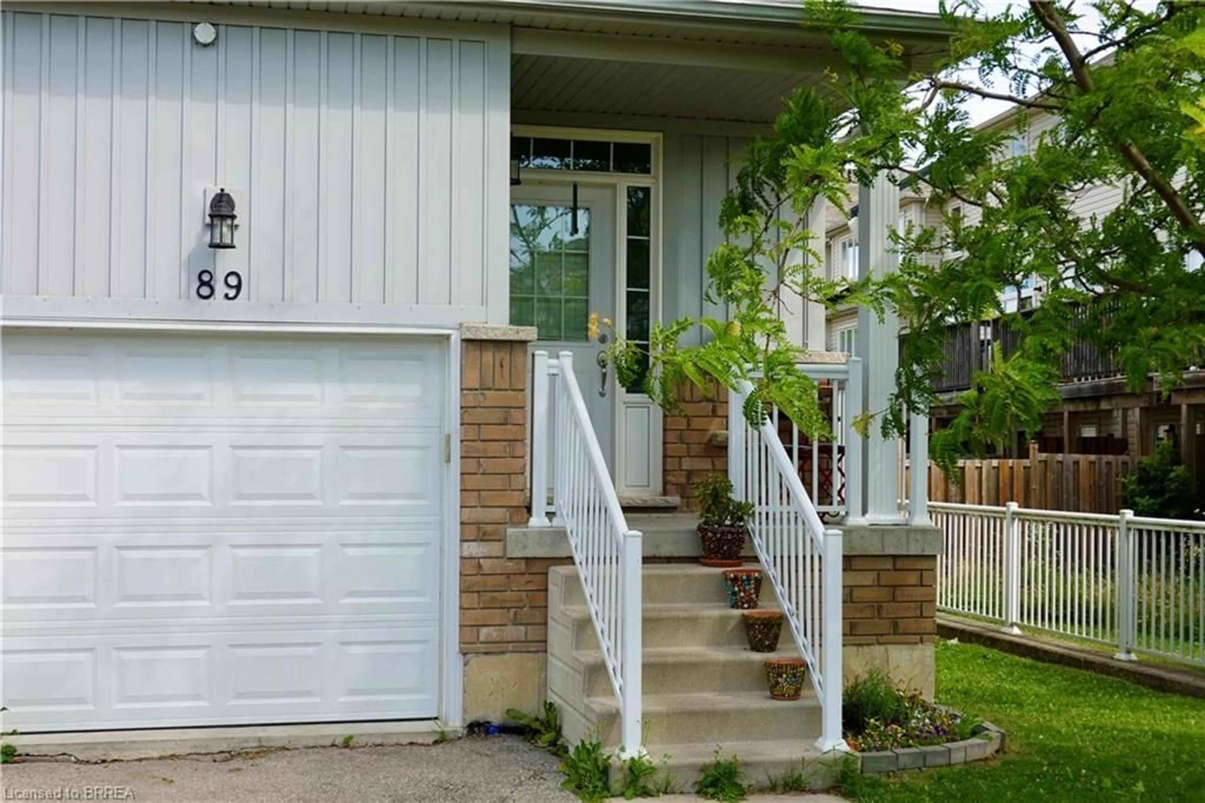 Home with vinyl exterior material, street for 21 Diana Ave #89, Brantford Ontario N3T 0G7