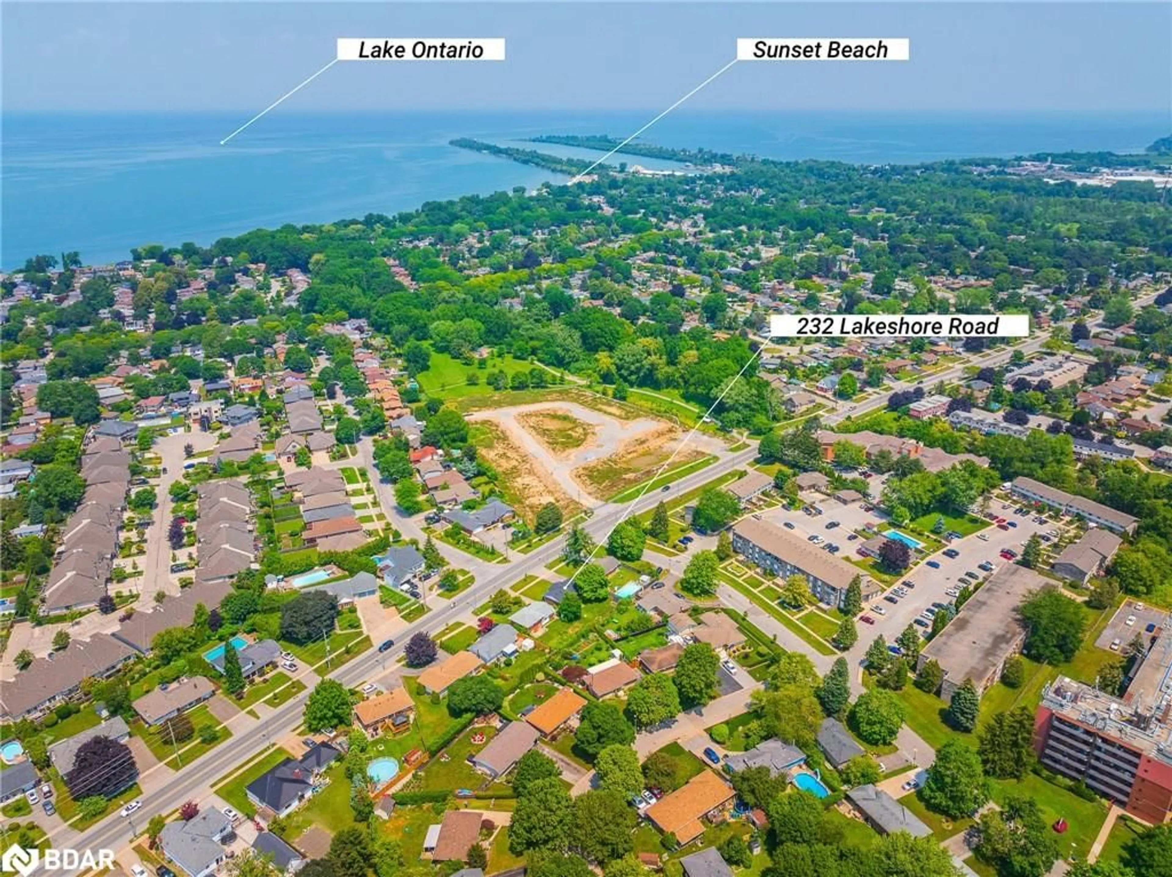 A pic from outside/outdoor area/front of a property/back of a property/a pic from drone, water/lake/river/ocean view for 232 Lakeshore Rd, St. Catharines Ontario L2M 1R5
