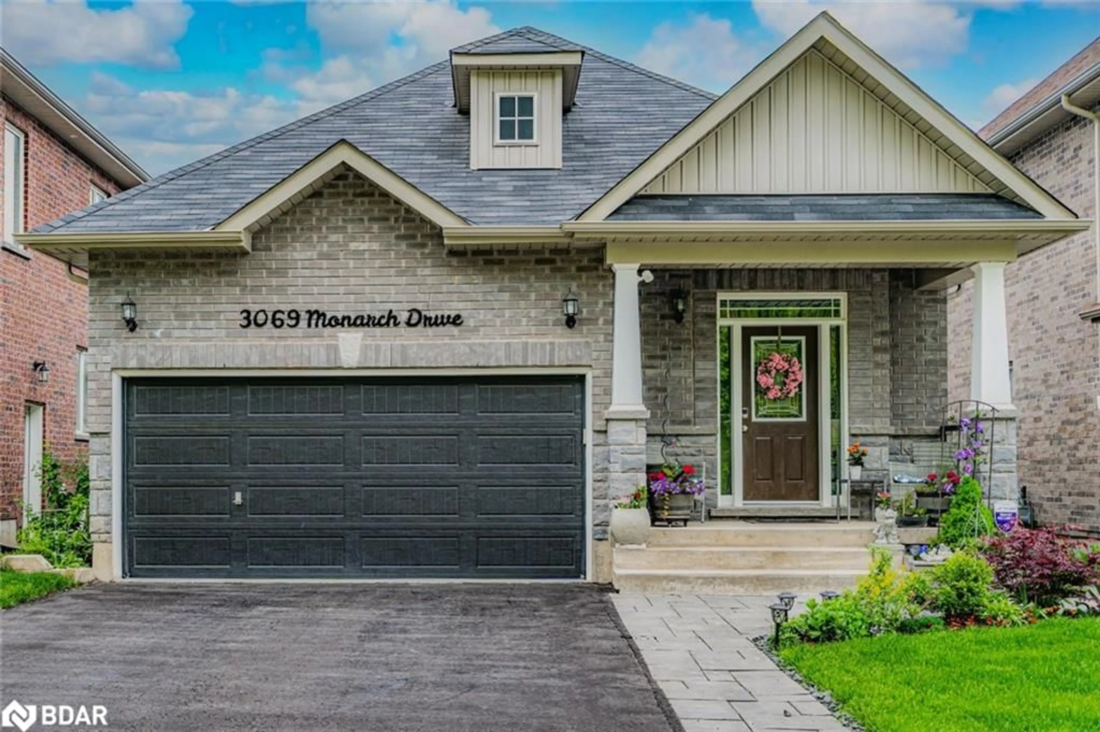 Home with brick exterior material, street for 3069 Monarch Dr, Orillia Ontario L3V 8K3