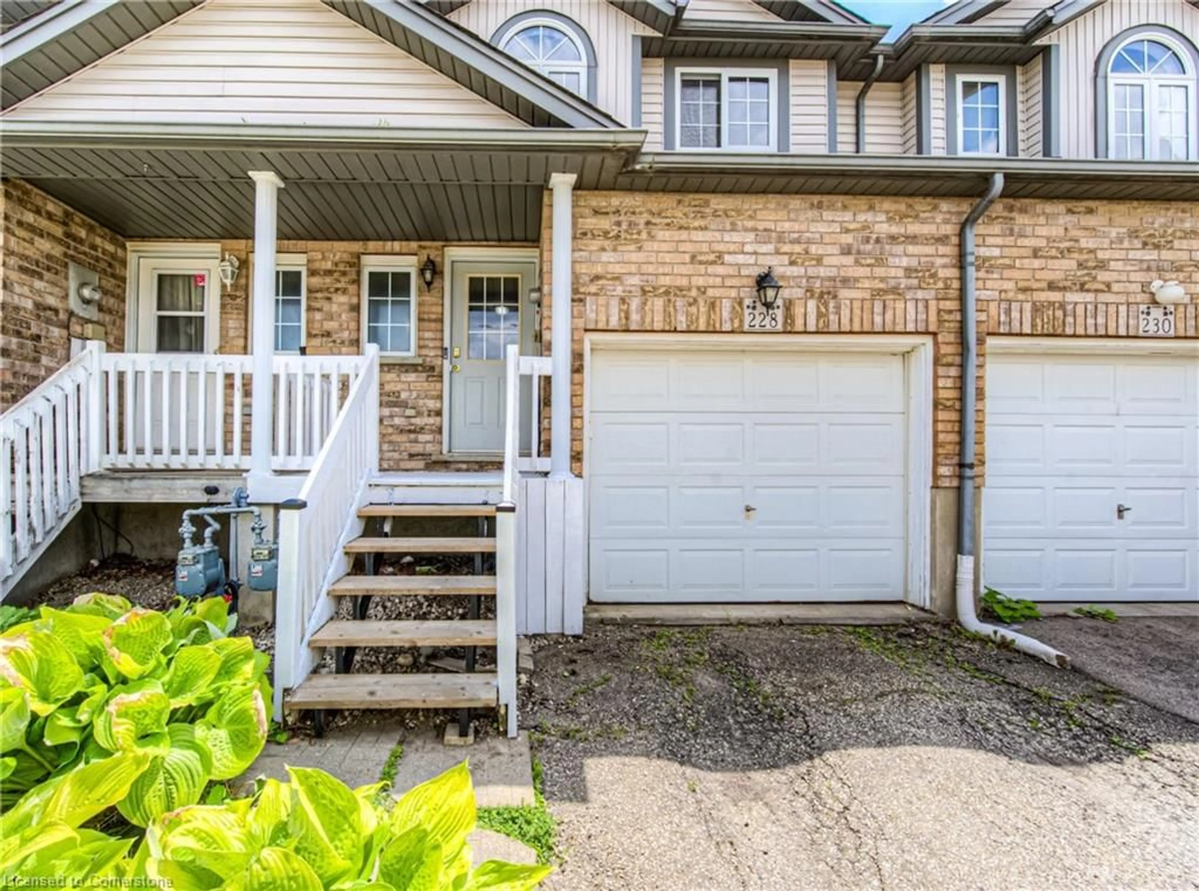 Home with vinyl exterior material, street for 228 Activa Ave, Kitchener Ontario N2E 3T8